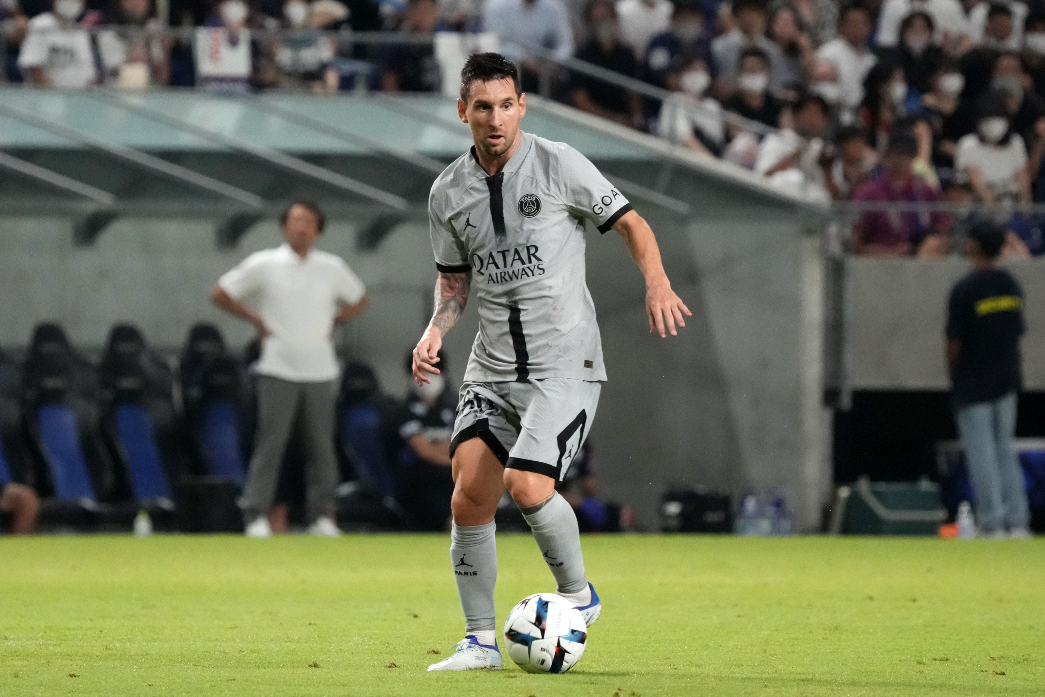 Lionel Messi in action for PSG vs Gamba Osaka