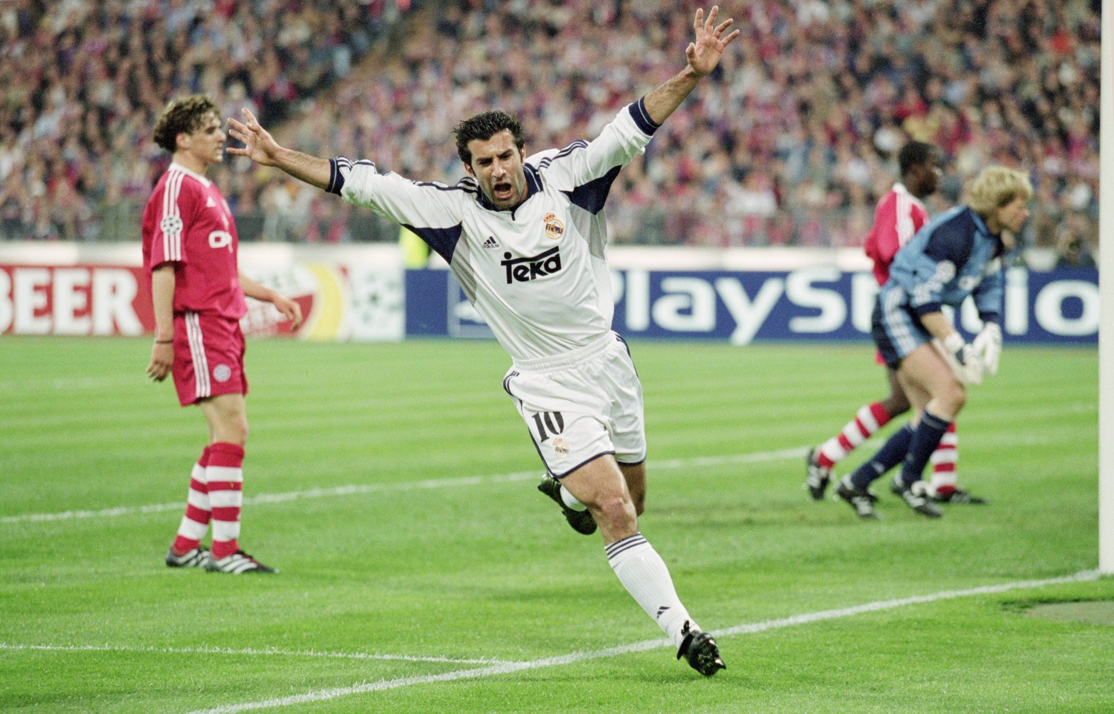 Luis Figo celebrates a goal for Real Madrid