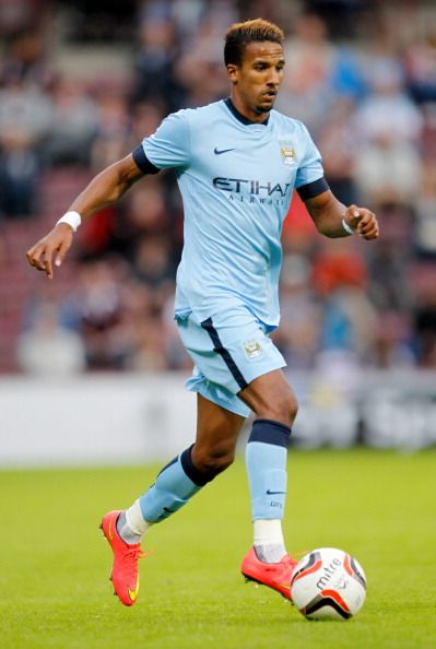 Sinclair playing for Man City.