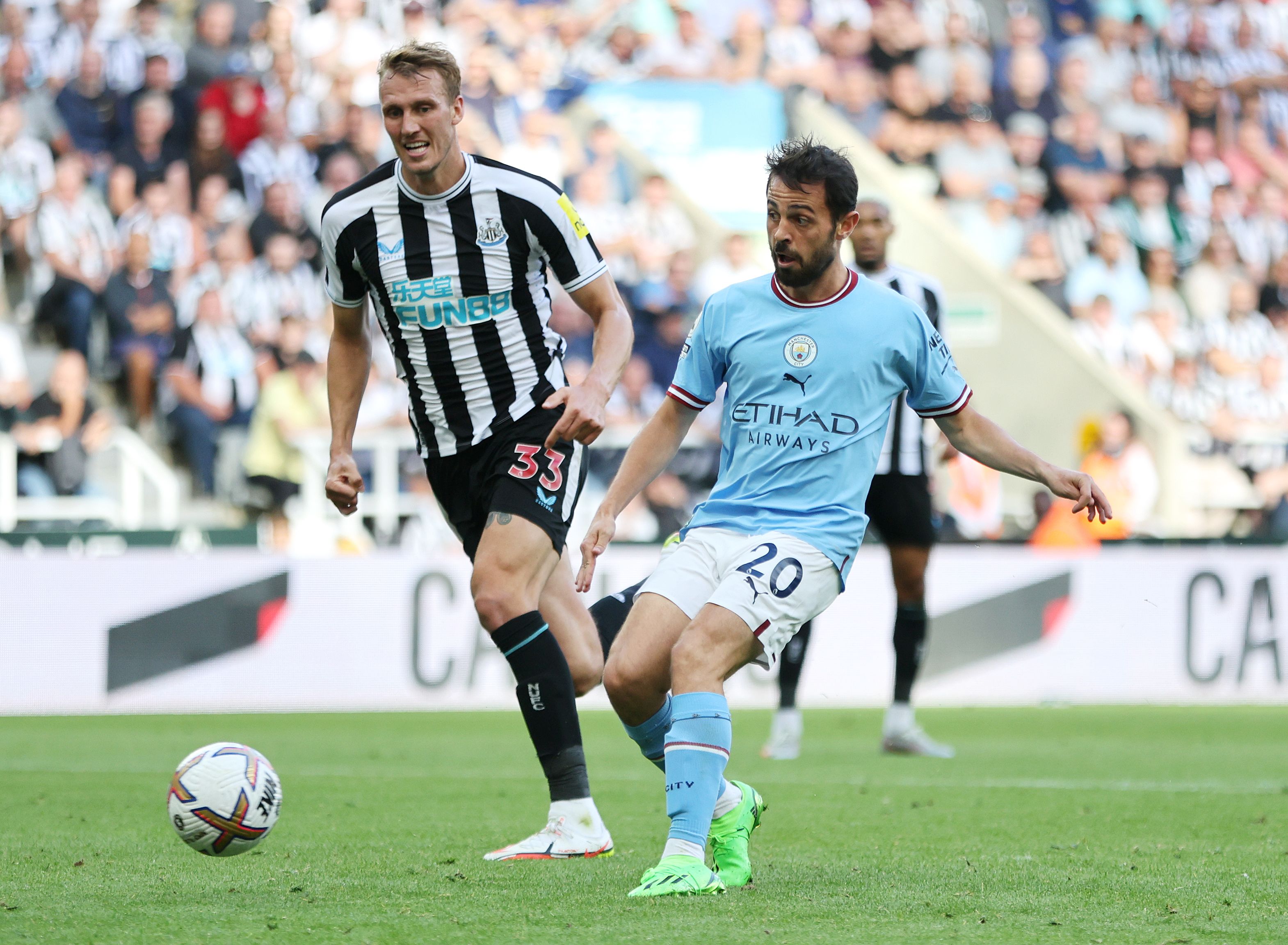 Bernardo Silva of Manchester City scores their side's third goal during the Premier League match between Newcastle United and Manchester City