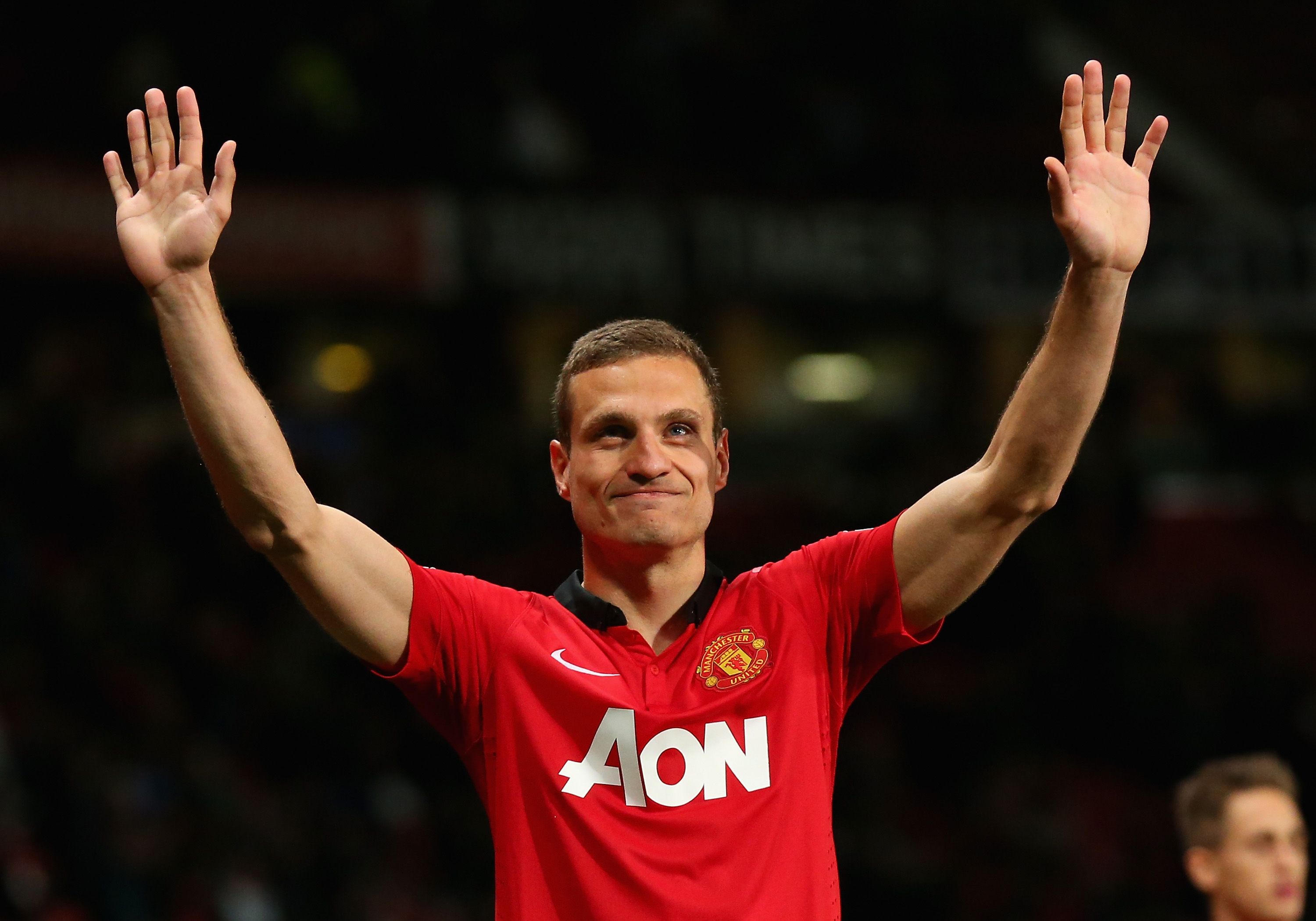 Nemanja Vidic of Manchester United salutes