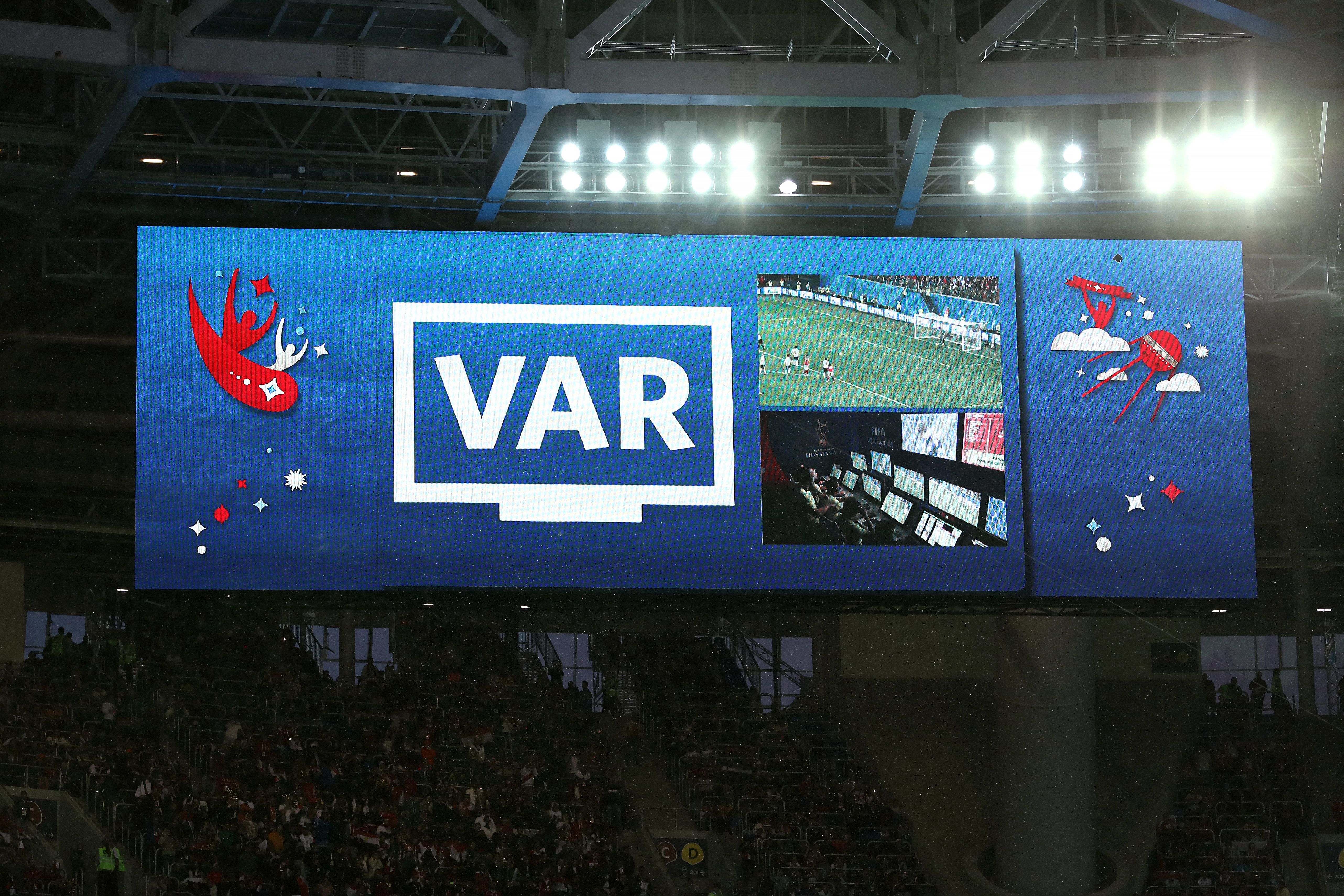 The big screen displays a VAR review