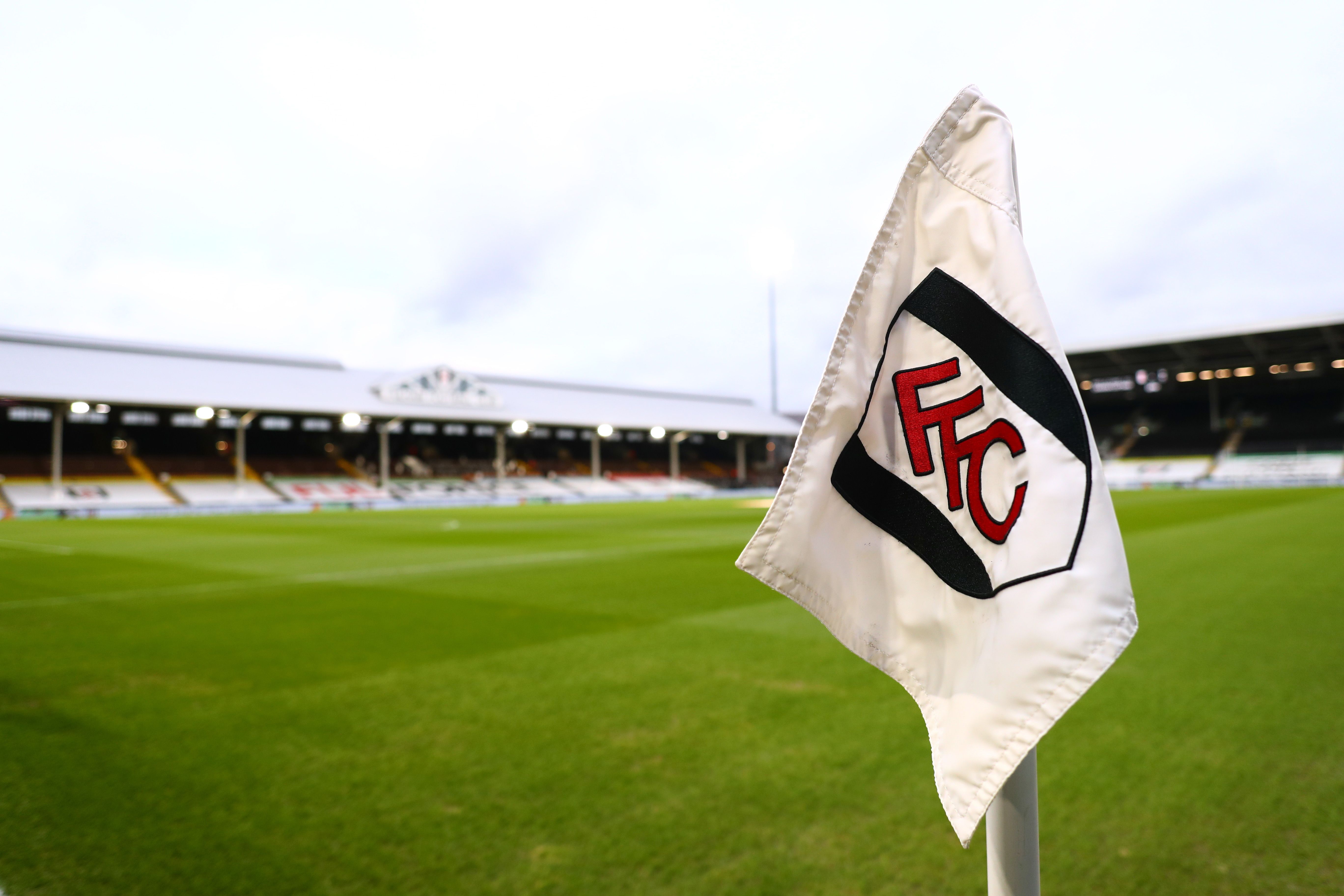 Fulham's badge on a corner flag.
