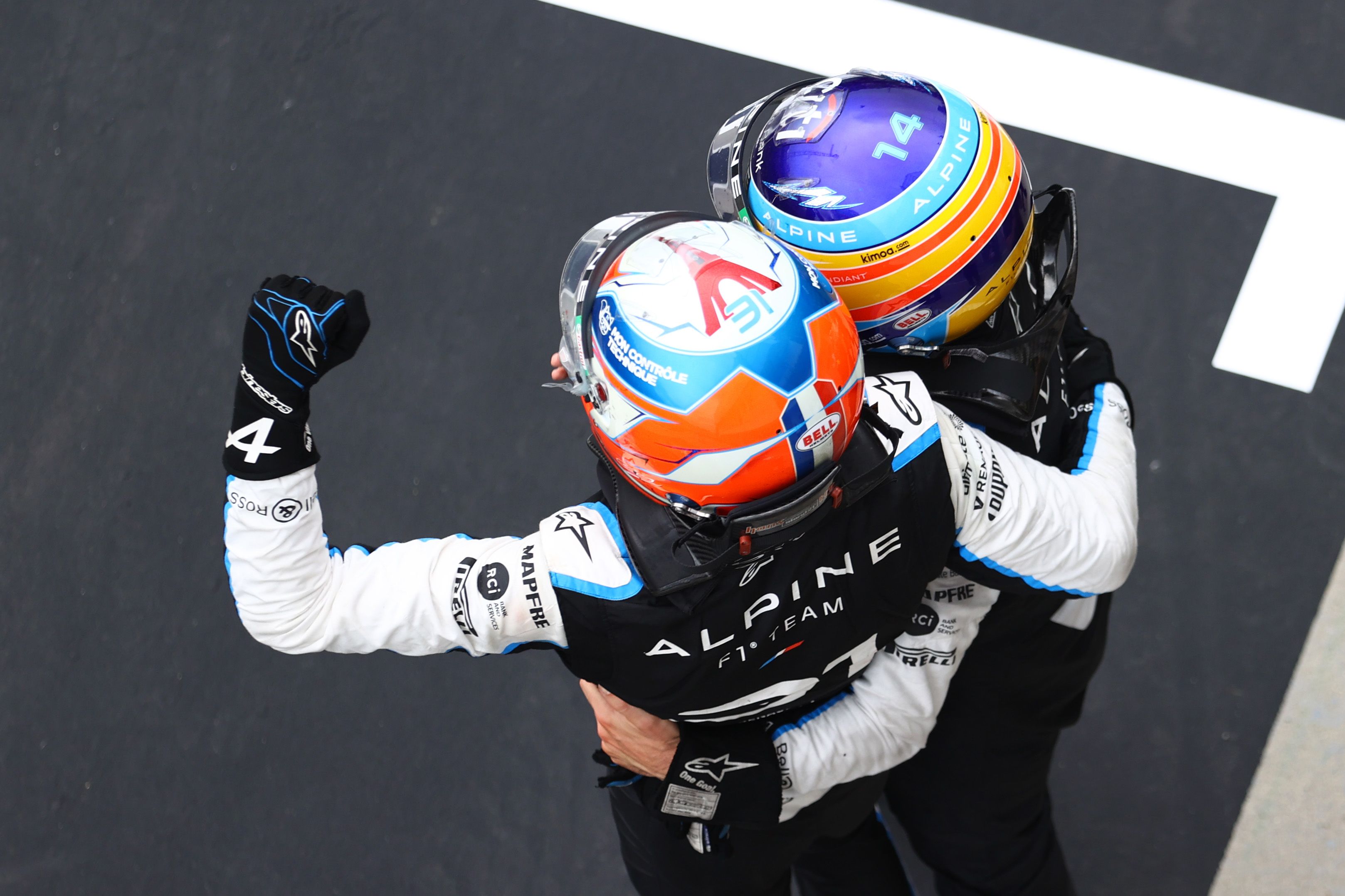Ocon and Alonso celebrate the Frenchman's win in Budapest