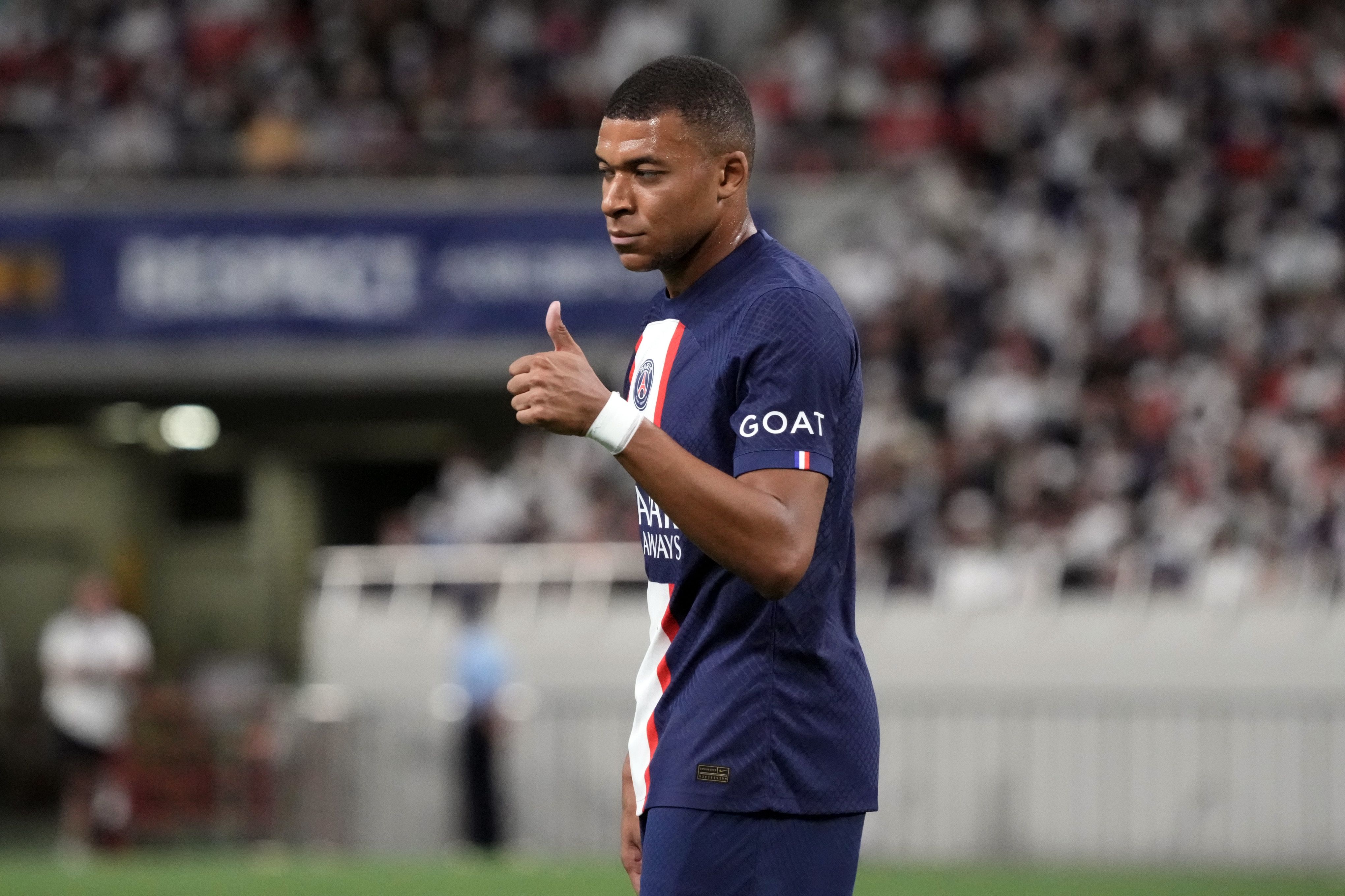 Kylian Mbappe gives a thumbs up
