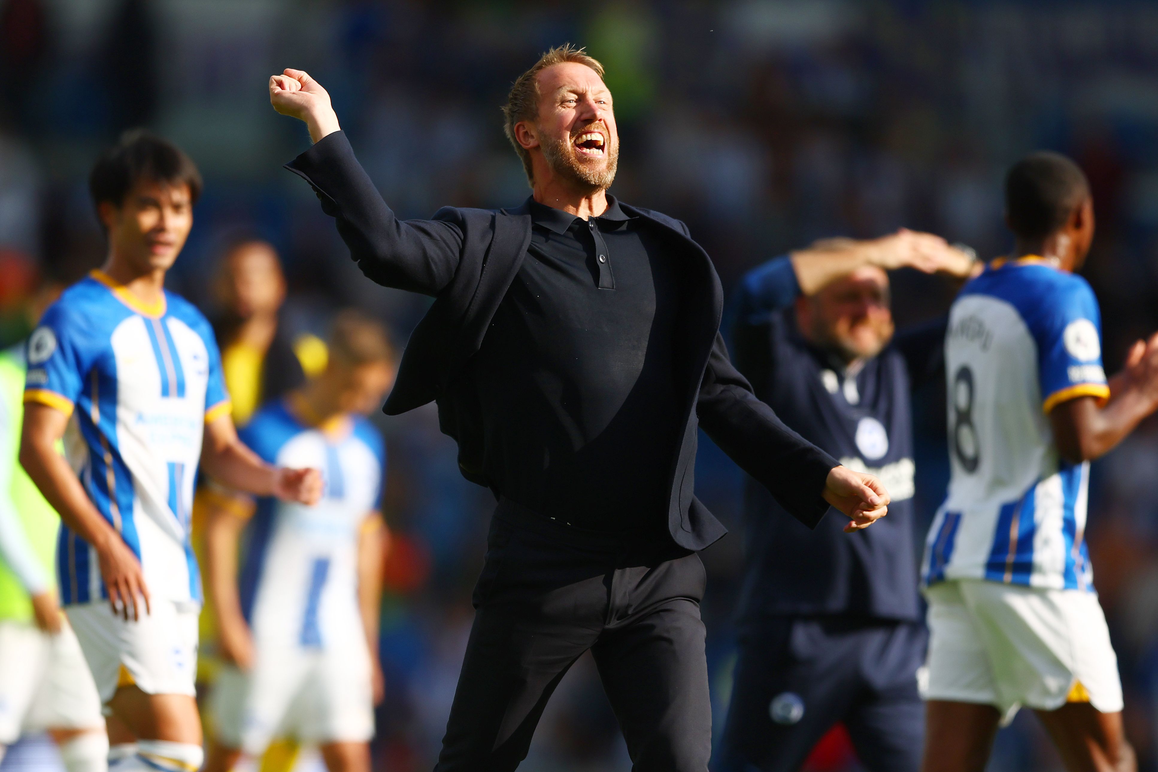 Graham Potter celebrates a Brighton victory over Leeds