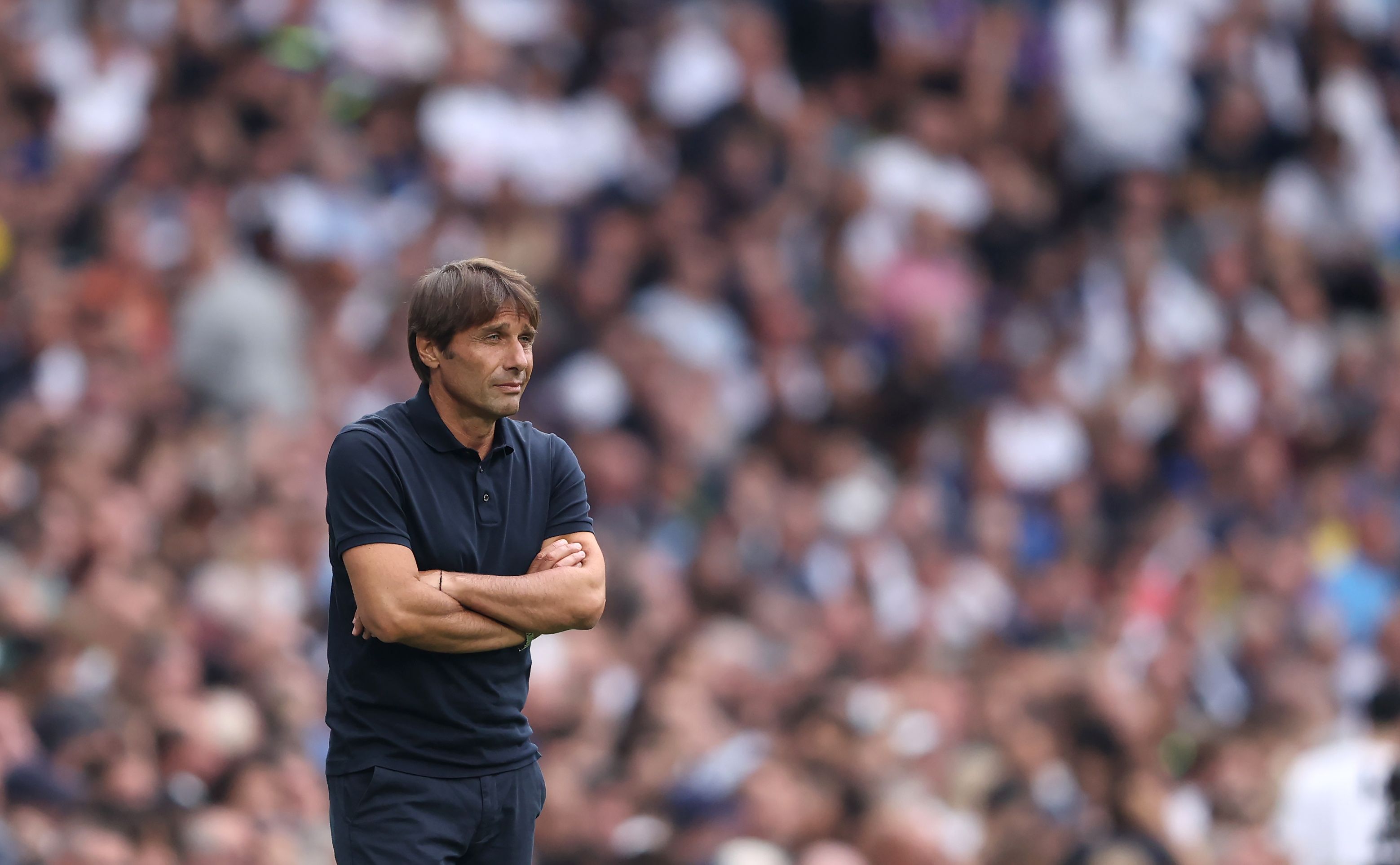 Antonio Conte, Head Coach of Tottenham Hotspur looks on
