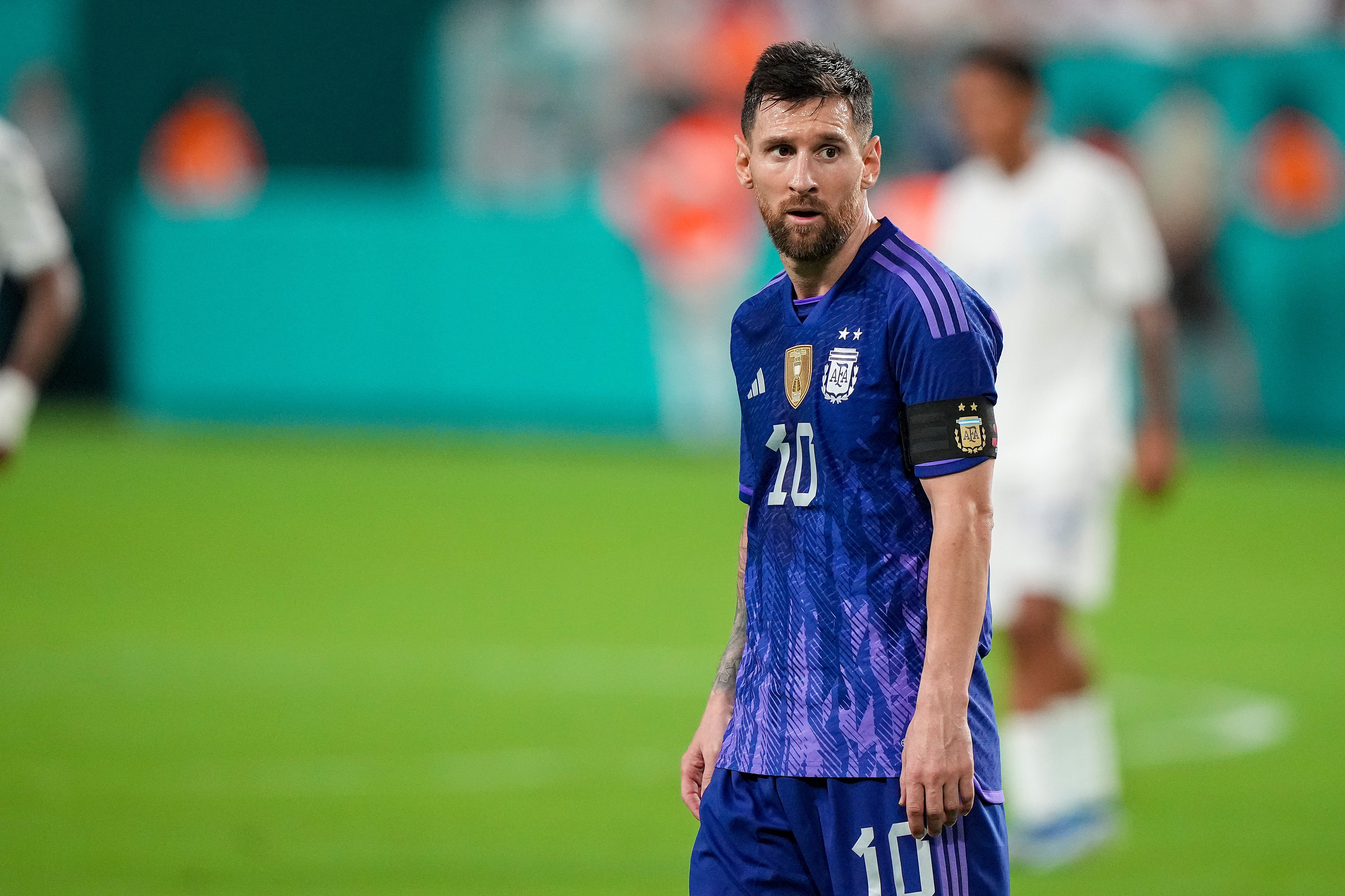 Argentina star Lionel Messi looks on