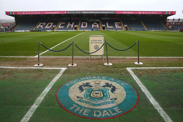 Rochdale's badge on the pitch.