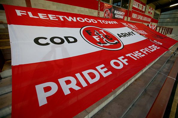 Fleetwood's badge on a banner.