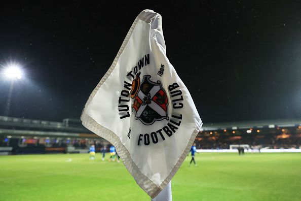 Luton's badge features a hat.