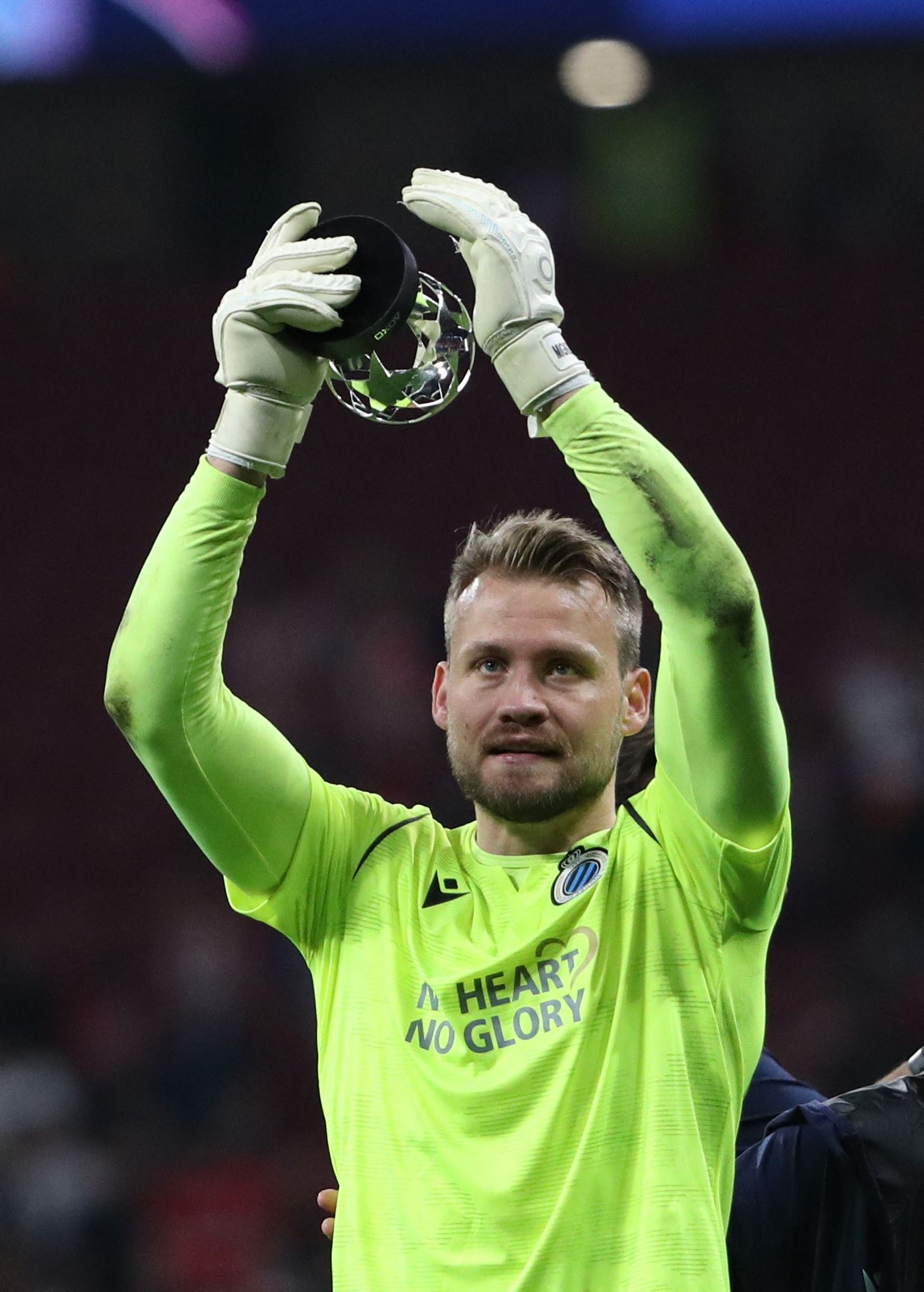 Brugge's Mignolet clapping.