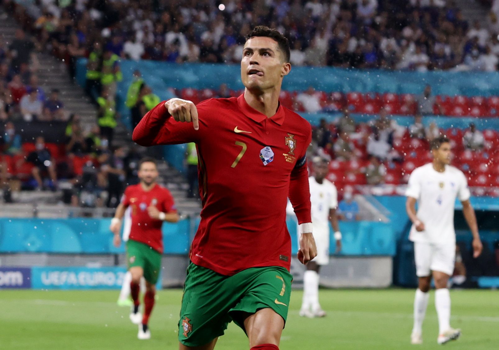 Cristiano Ronaldo celebrates scoring for Portugal versus France