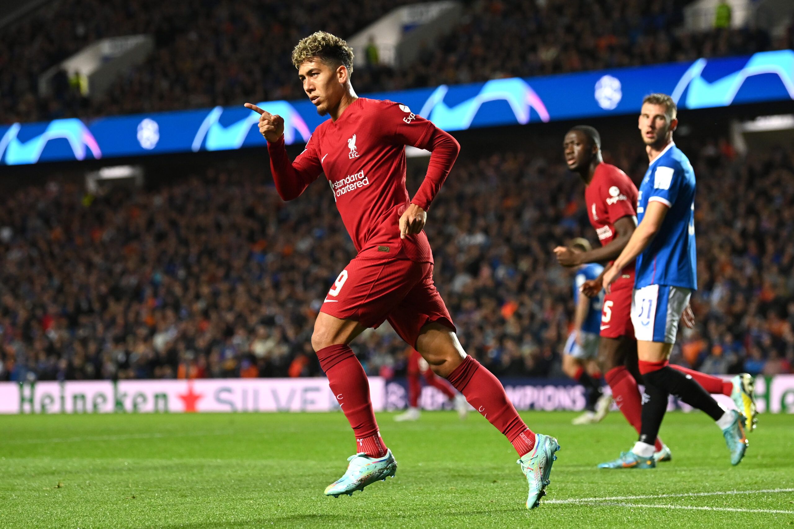 Roberto Firmino celebrates scoring for Liverpool vs Rangers