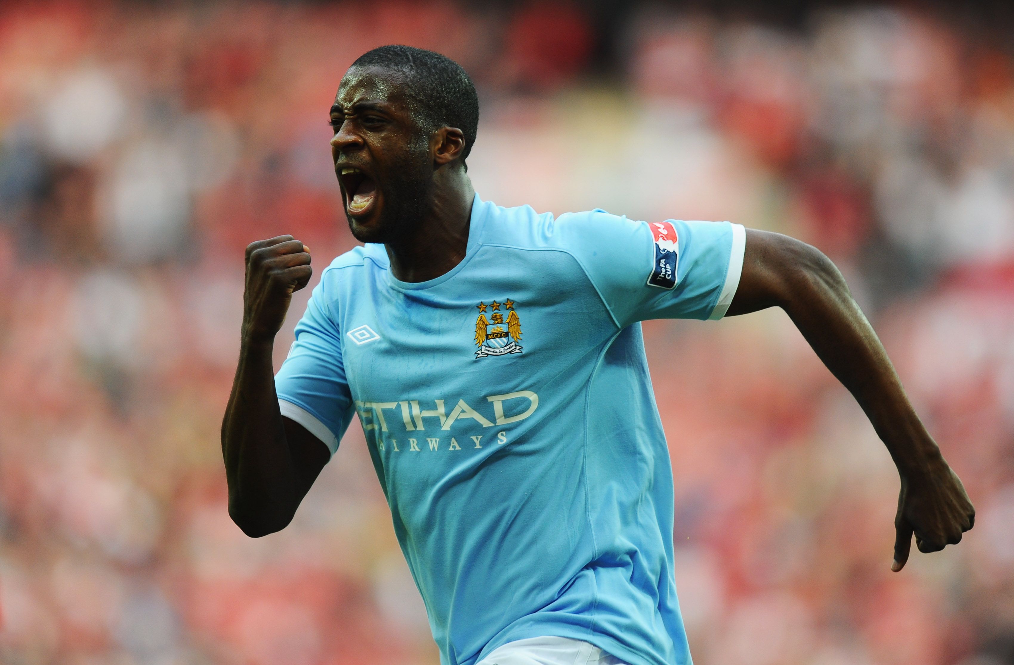 Yaya Toure of Manchester City celebrates scoring the opening goal during the FA Cup