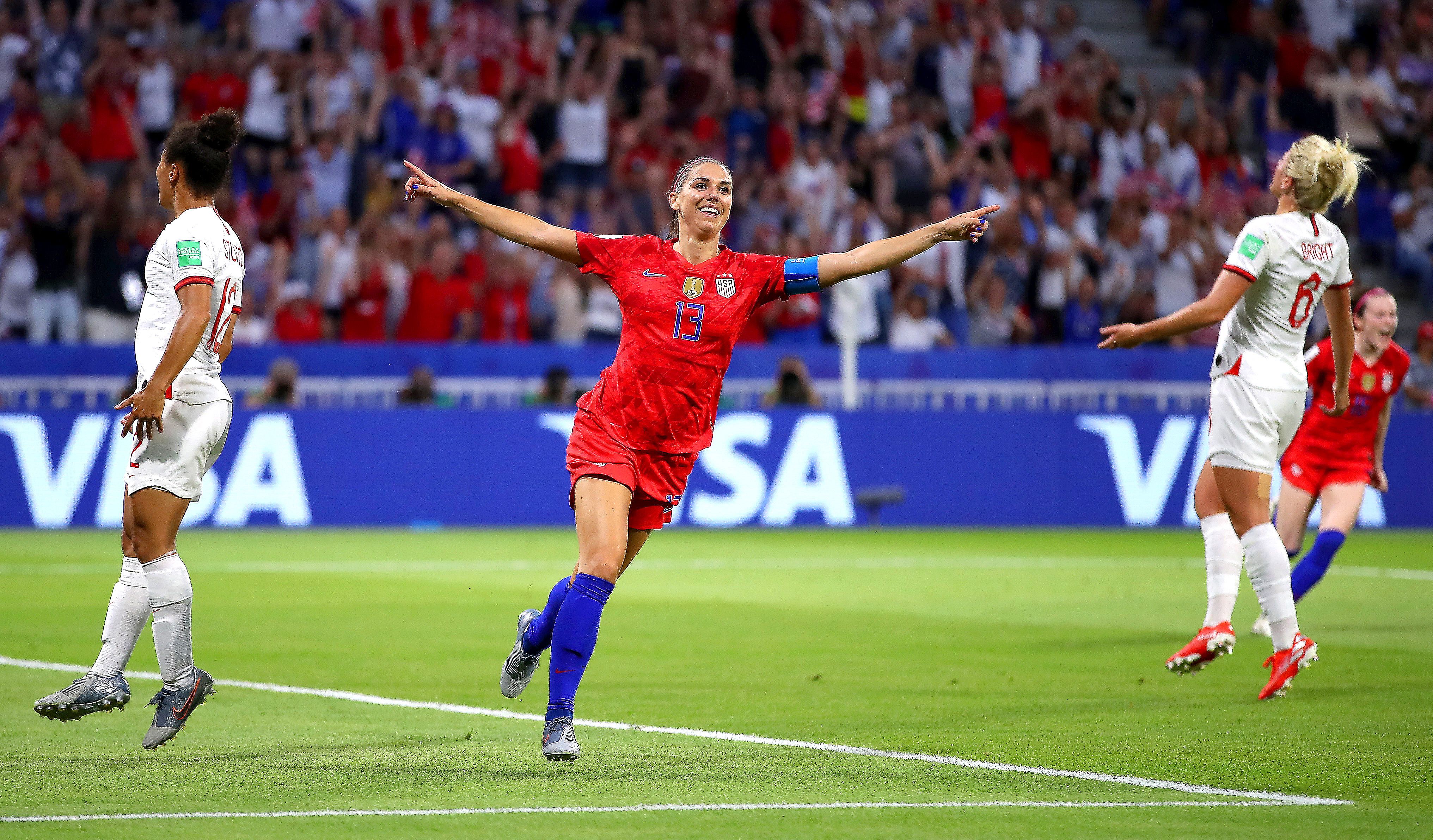 Alex Morgan scores against England in the Women's World Cup semi-final