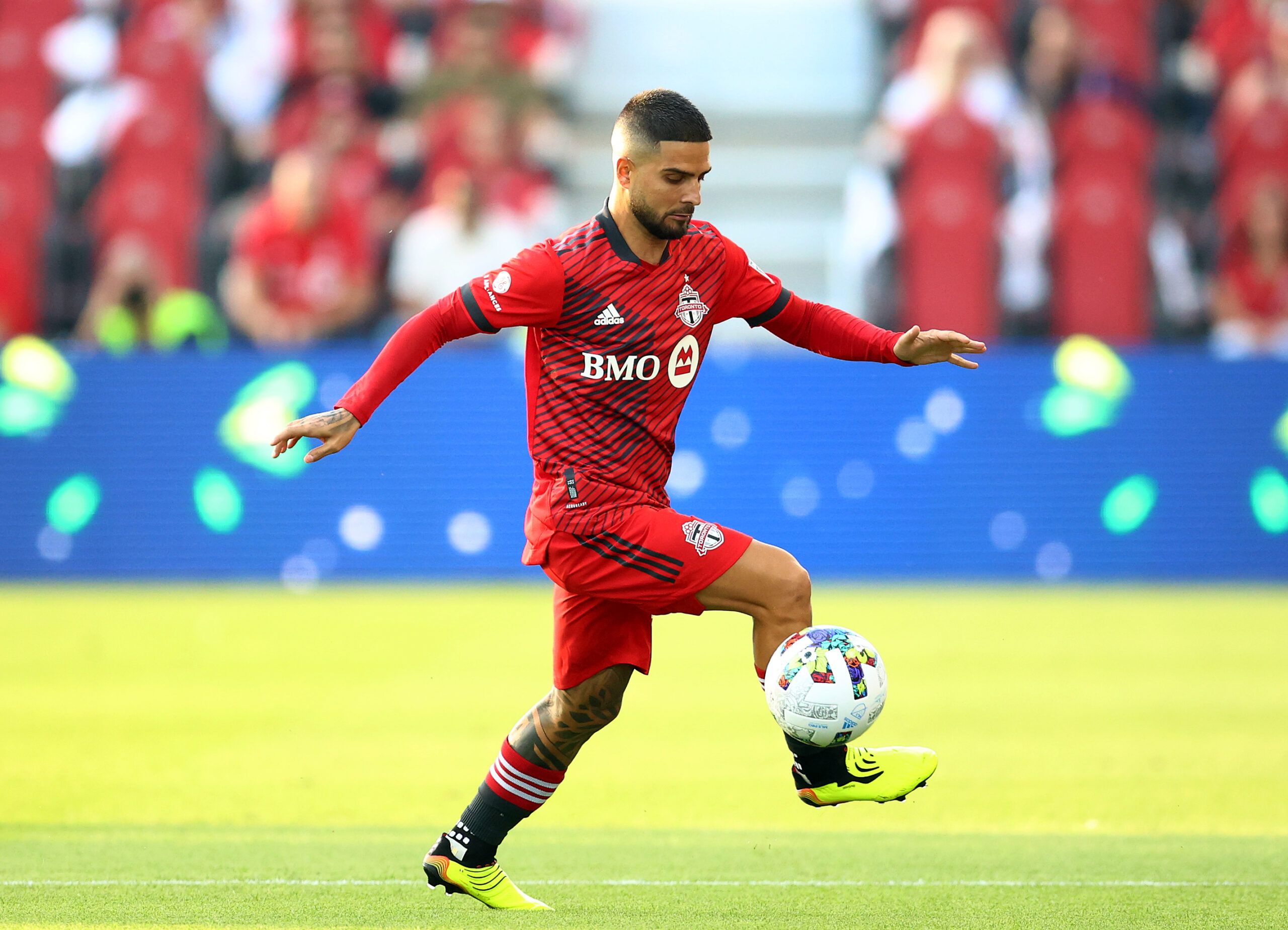 Lorenzo Insigne of Toronto FC juggles the ball while making his MLS debut against Charlotte FC