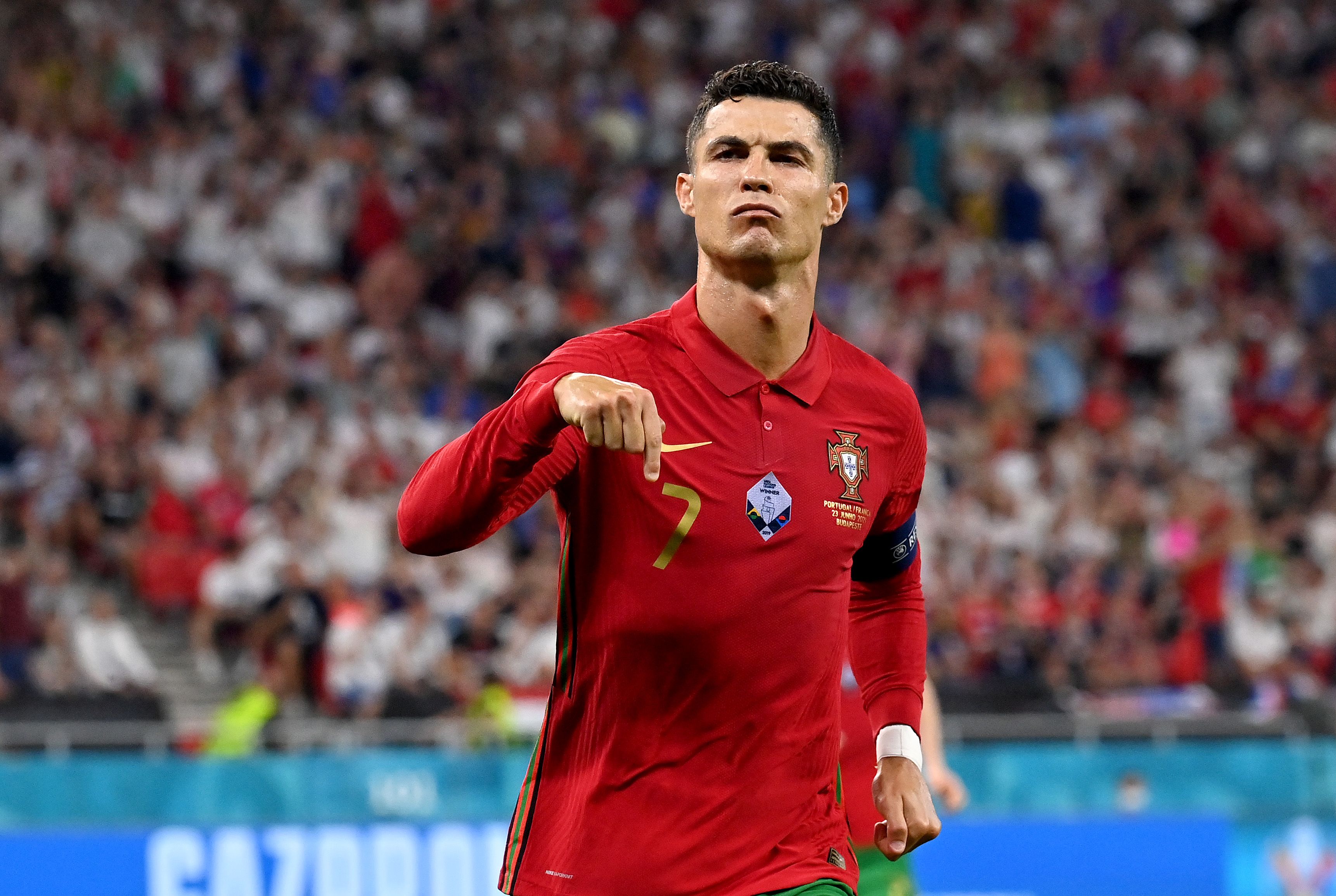 Cristiano Ronaldo points downwards in celebration
