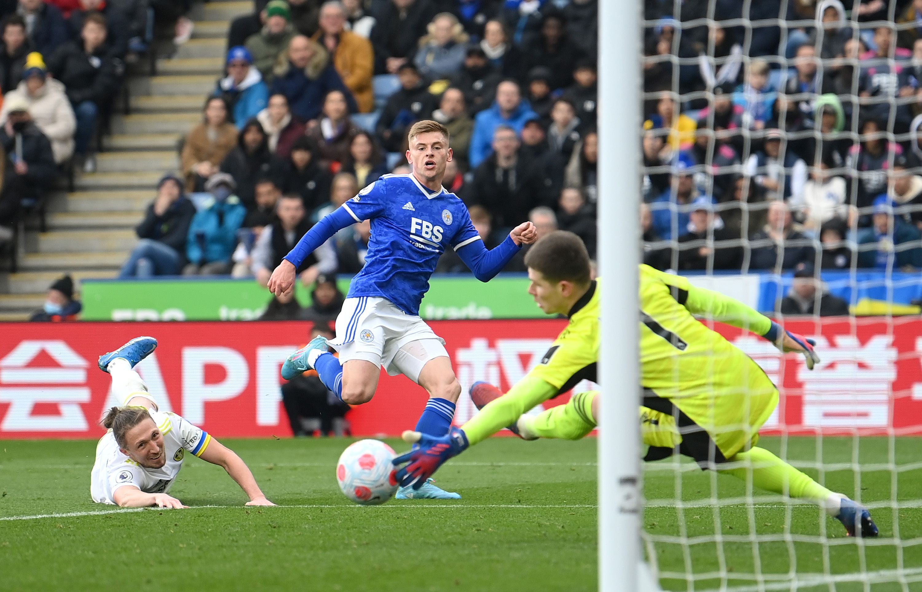 Harvey Barnes of Leicester City scores their side's first goal past Illan Meslier of Leeds United 
