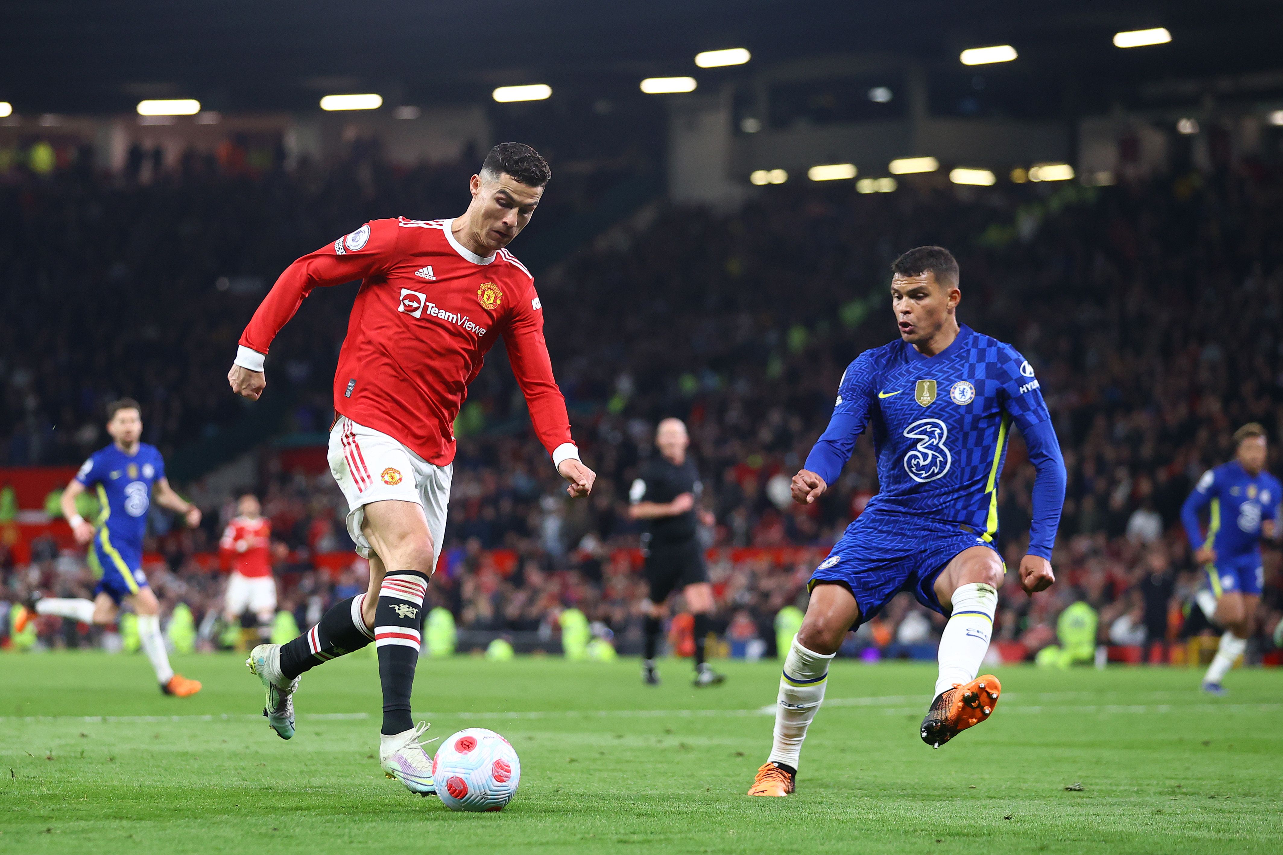 Cristiano Ronaldo of Manchester United tracked by Thiago Silva of Chelsea