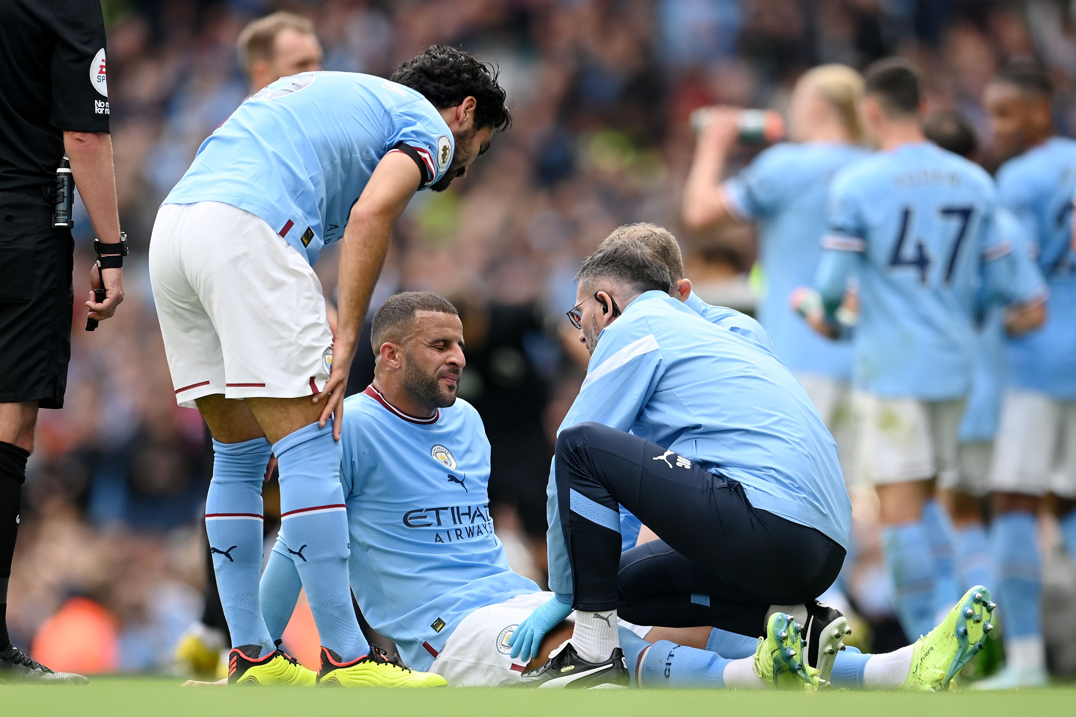 Kyle Walker of Manchester City receives medical attention 