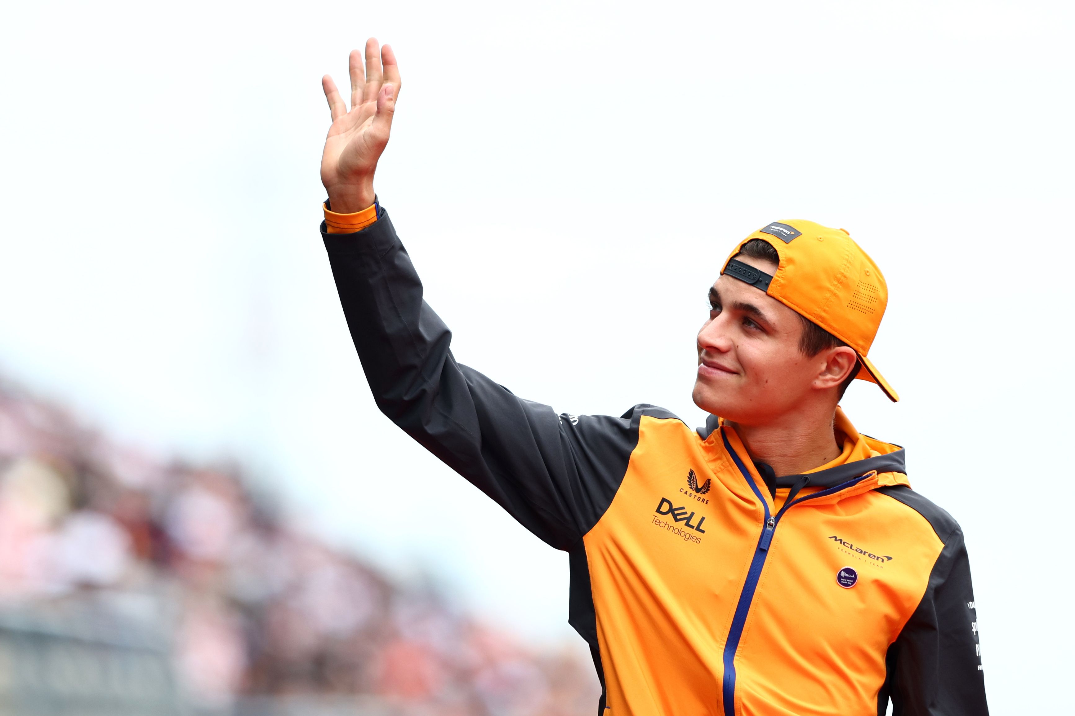 Lando Norris waves to the crowd at the Japanese Grand Prix