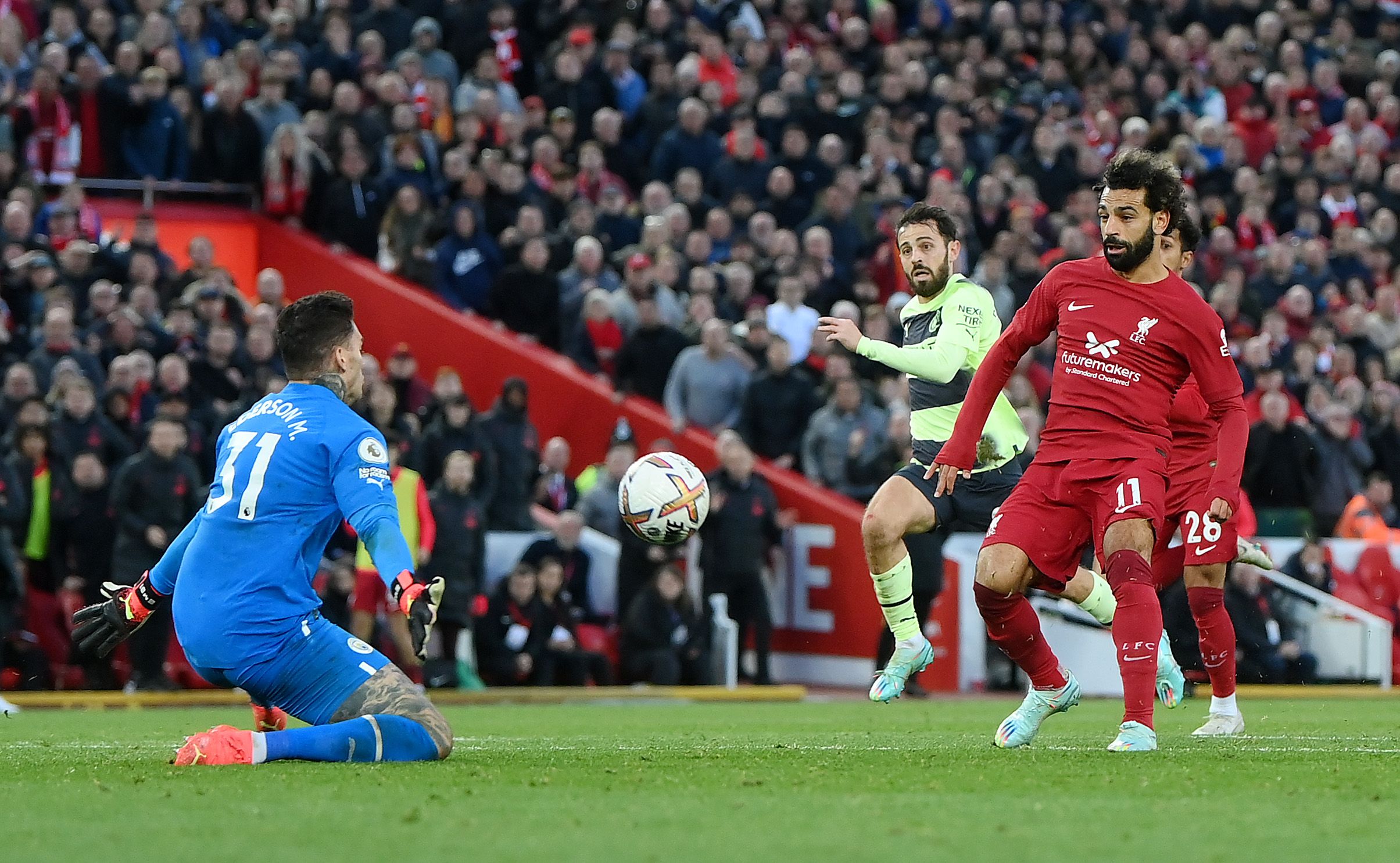 OCTOBER 16: Mohamed Salah of Liverpool scores their side's first goal past Ederson of Manchester City during the Premier League match 
