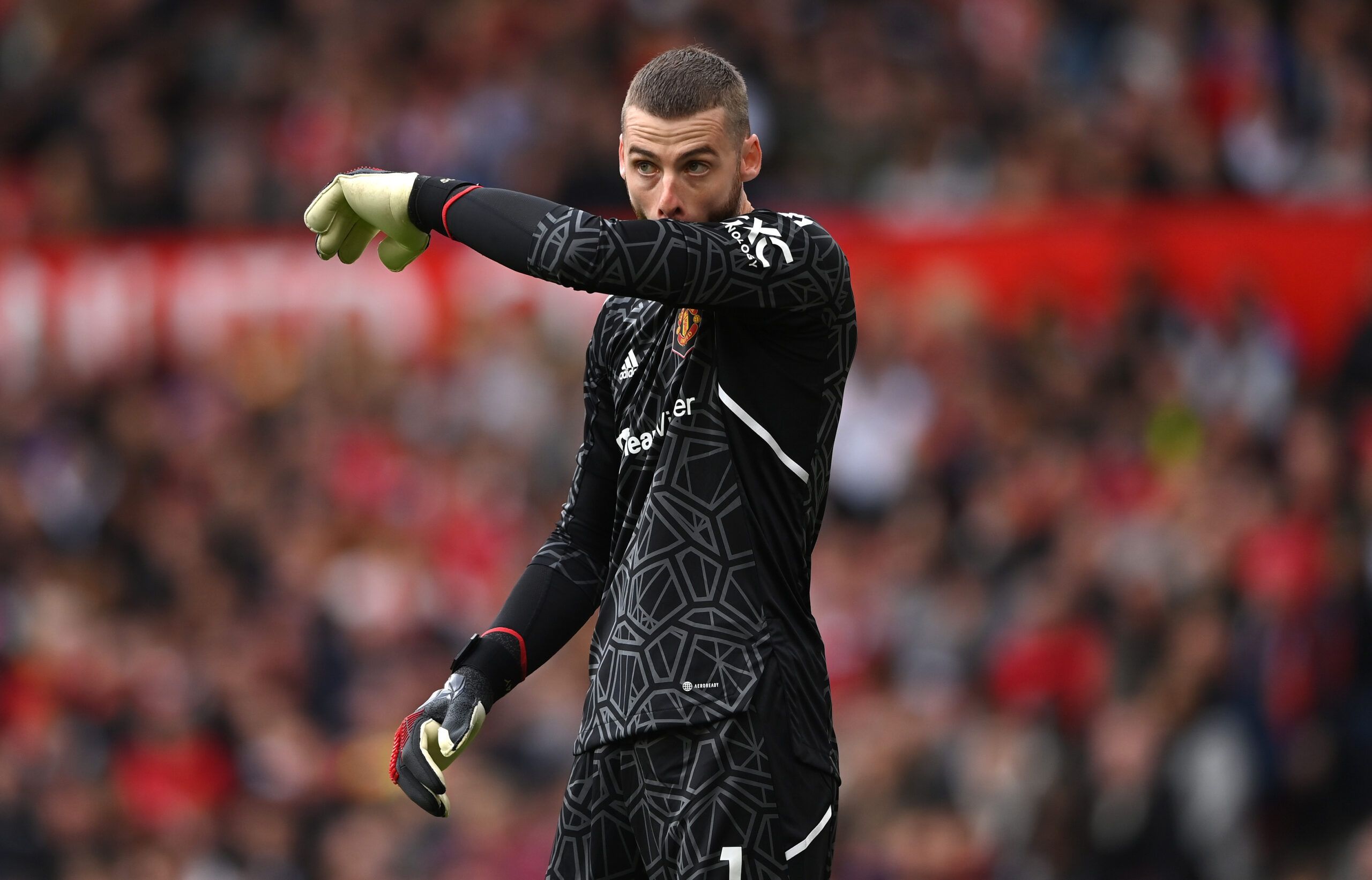 Manchester United goalkeeper David De Gea reacts during the Premier League match between Manchester United and Newcastle United at Old Trafford on October 15, 2022 in Manchester, England.