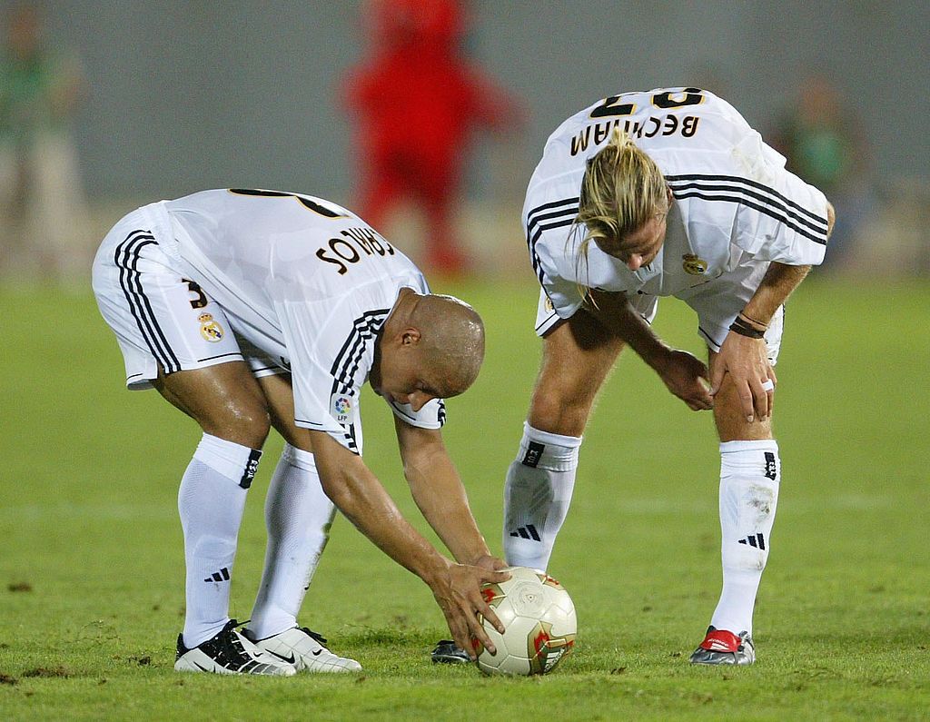 Roberto Carlos and David Beckham in action for Real Madrid