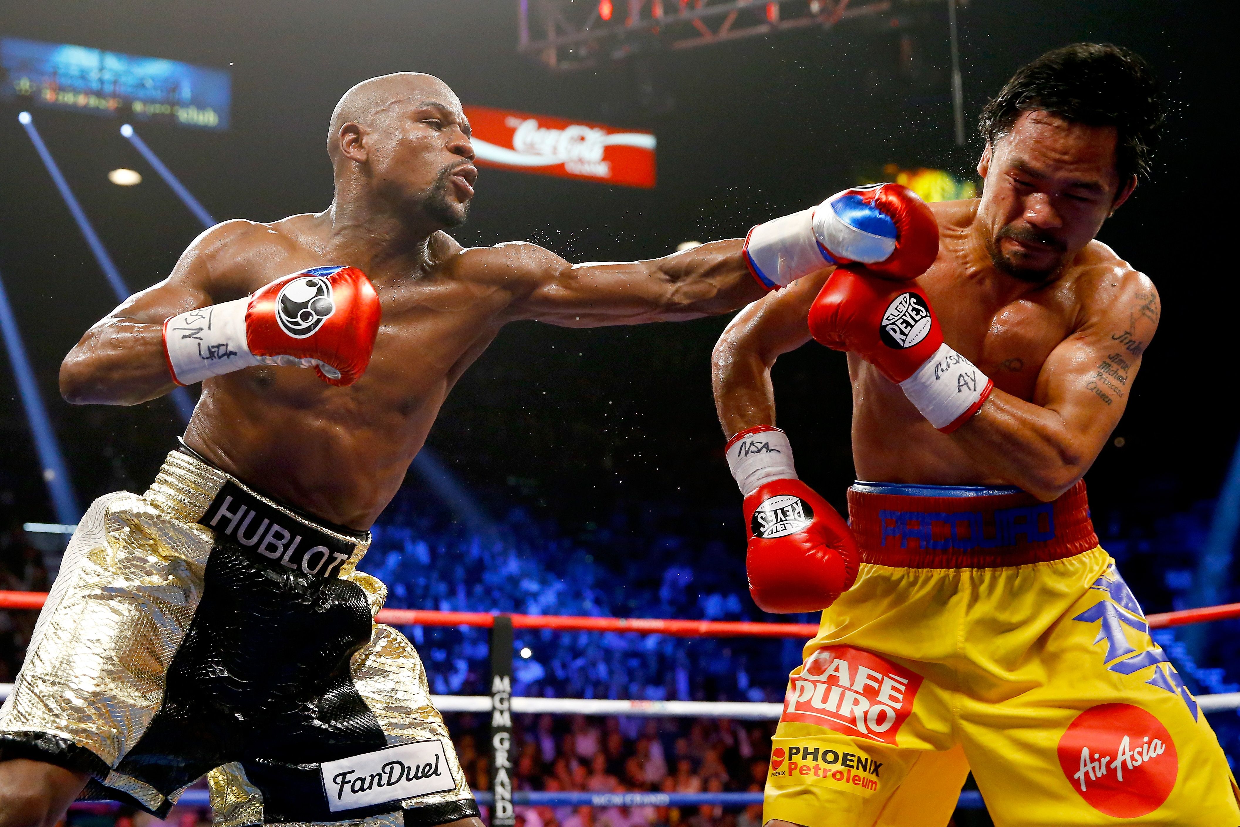 Floyd Mayweather & Manny Pacquiao teaching their sons boxing