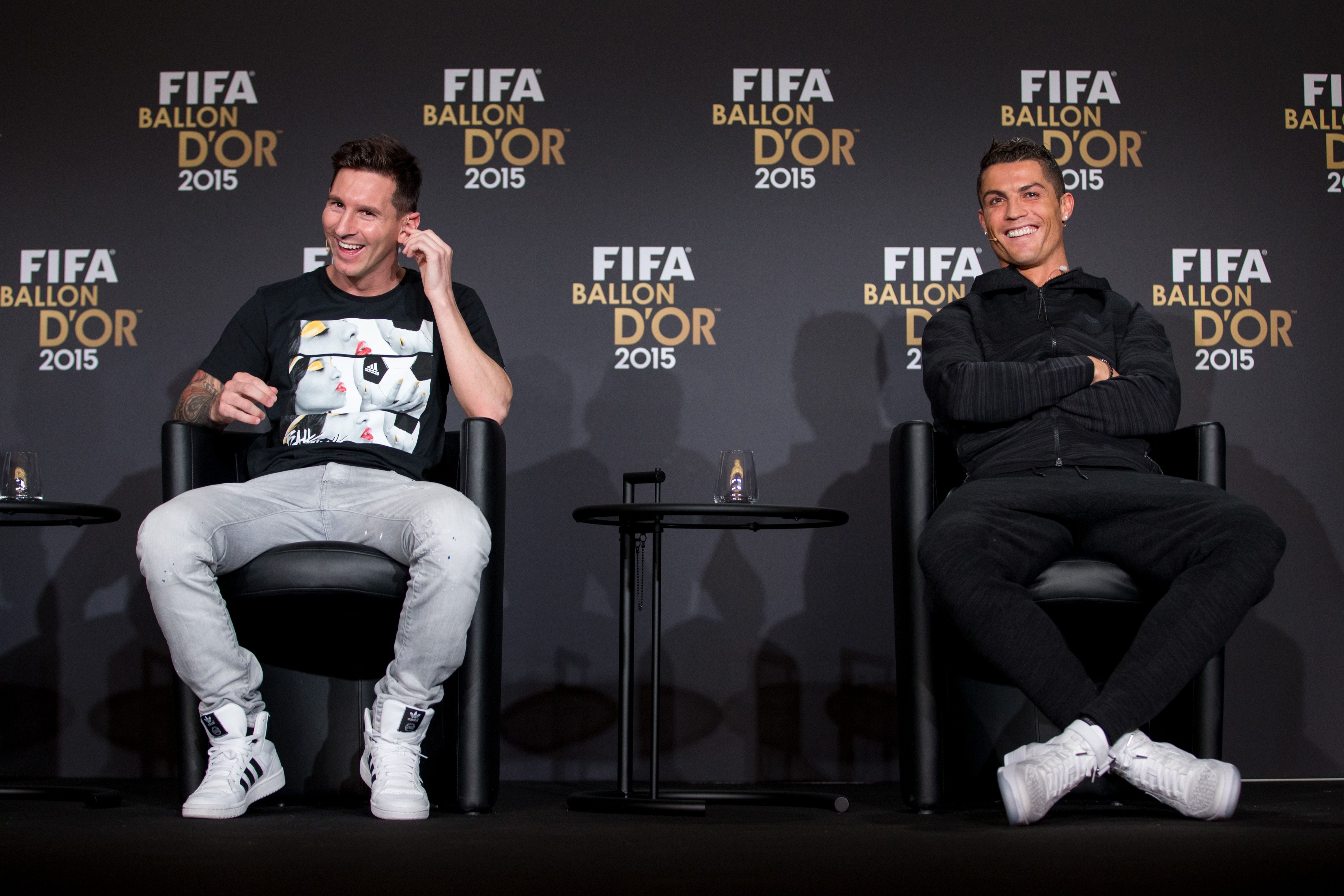 Lionel Messi and Cristiano Ronaldo at a press conference