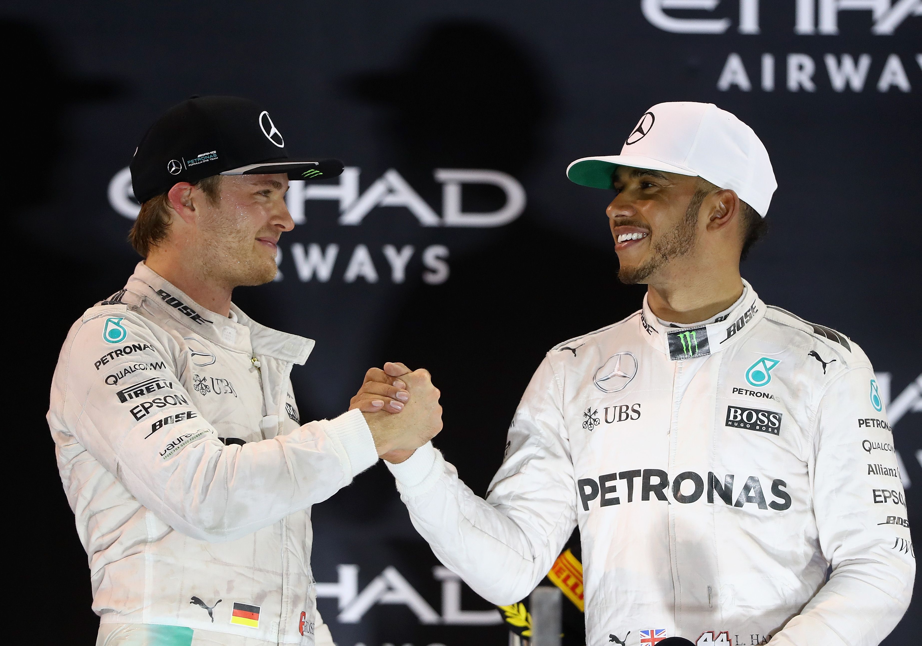 Nico Rosberg shakes hands with Lewis Hamilton