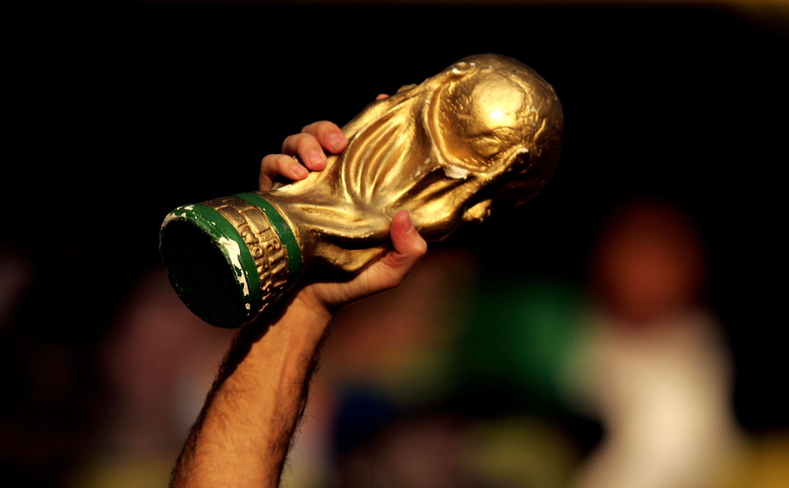 The World Cup trophy held aloft