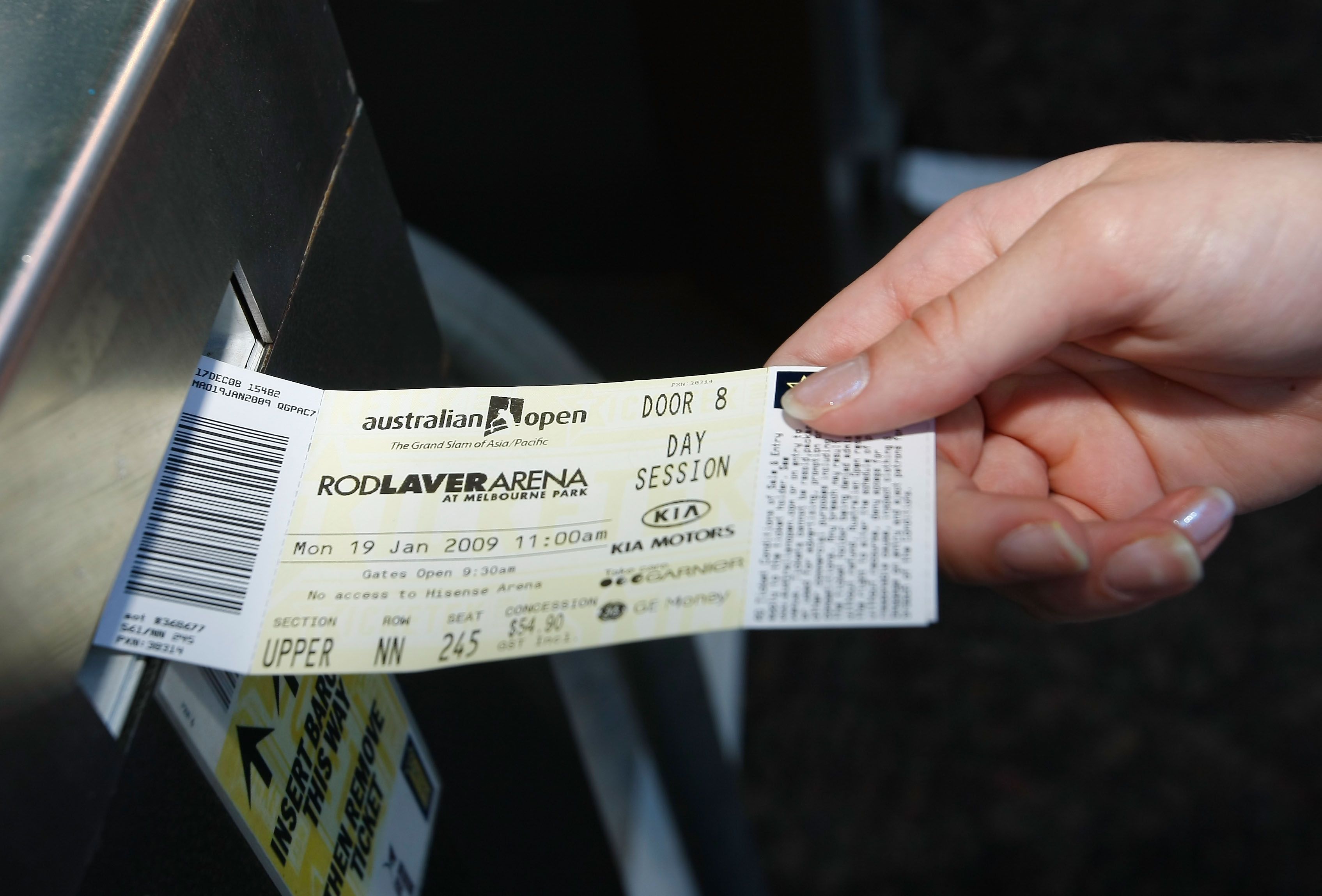 A fan has their ticket scanned in at an entry point during day one of the 2009 Australian Open at Melbourne Park on January 19, 2009 in Melbourne, Australia.