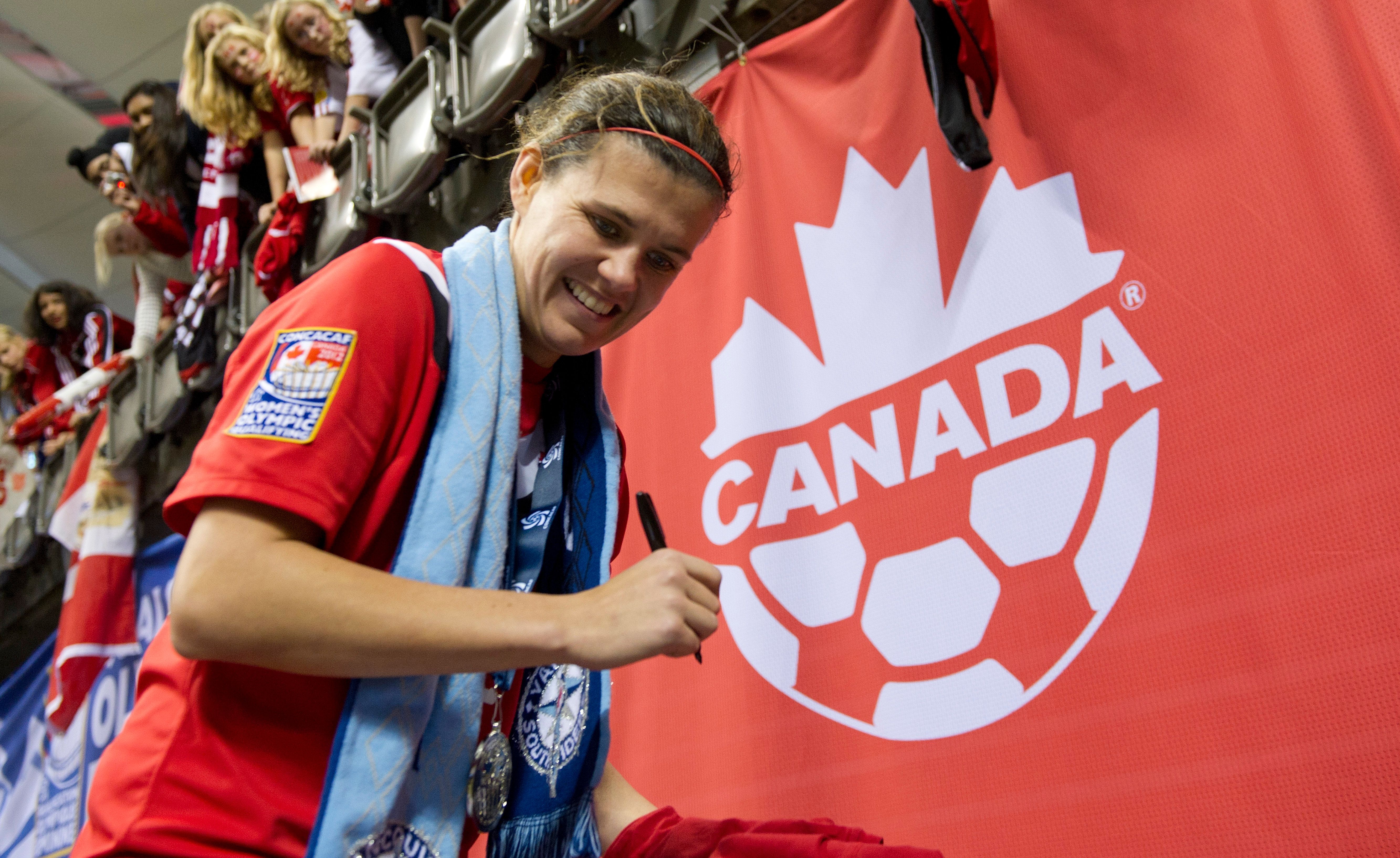 Christine Sinclair signs autographs for Canada fans