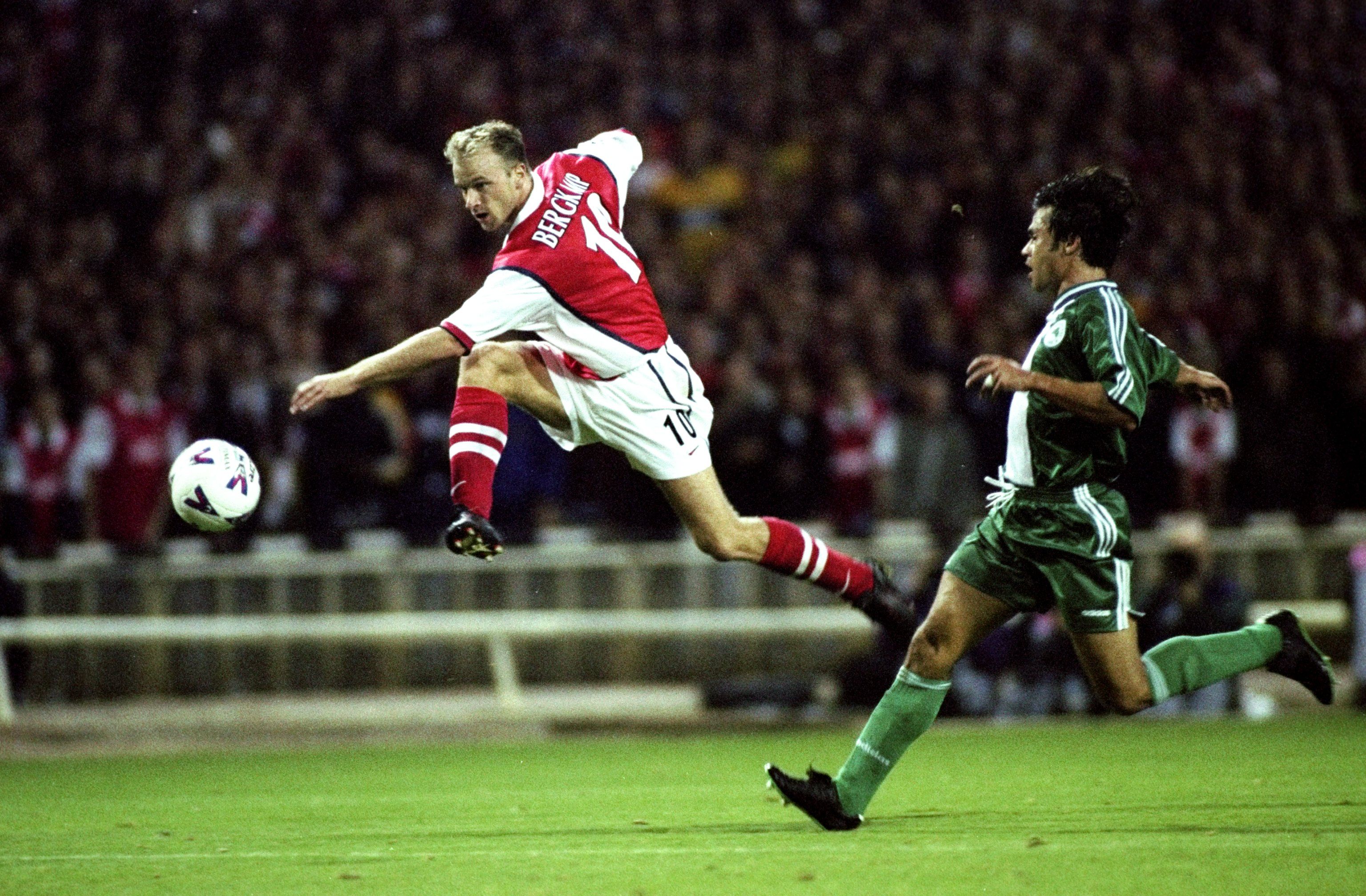 Dennis Bergkhamp scores for Arsenal in 1998 Champions League