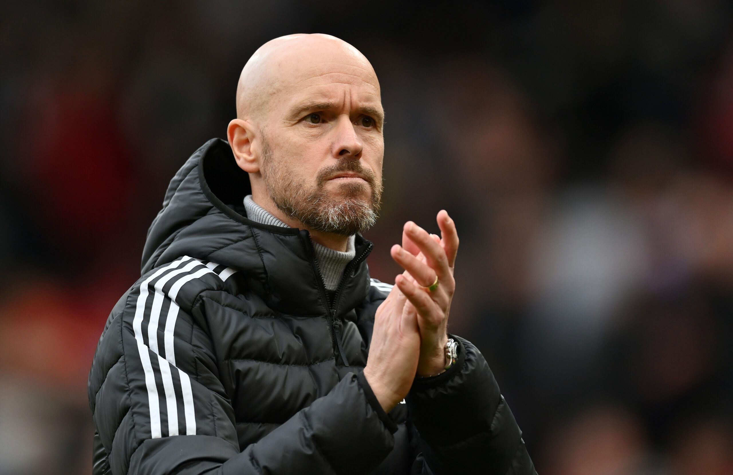 Erik ten Hag applauds crowd as he walks to the tunnel at Old Trafford