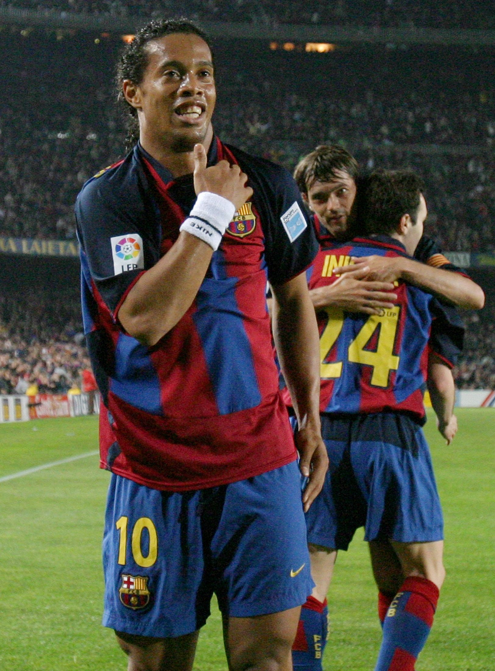 Ronaldinho celebrates at Barcelona.