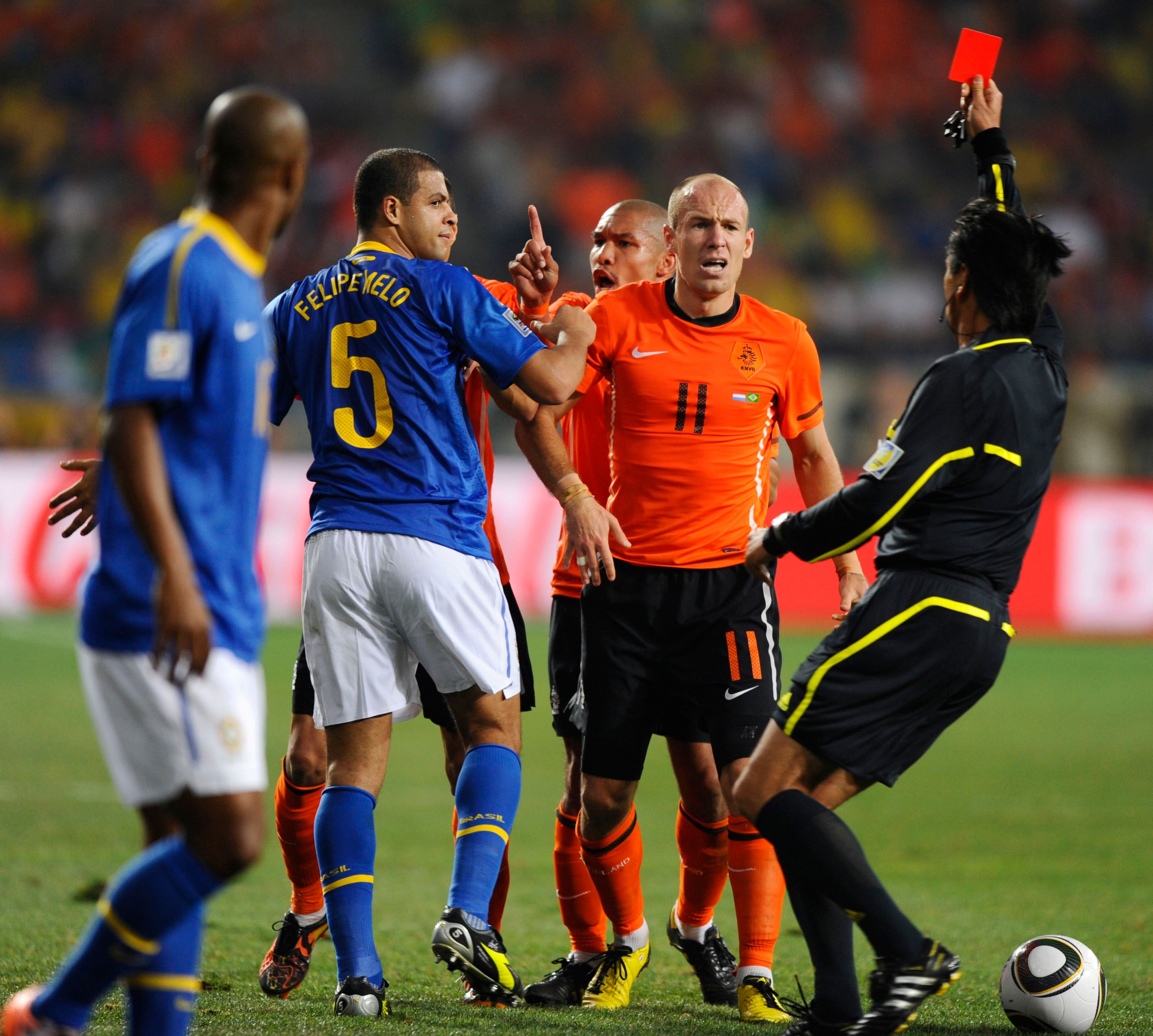Melo is sent off for his foul on Robben.