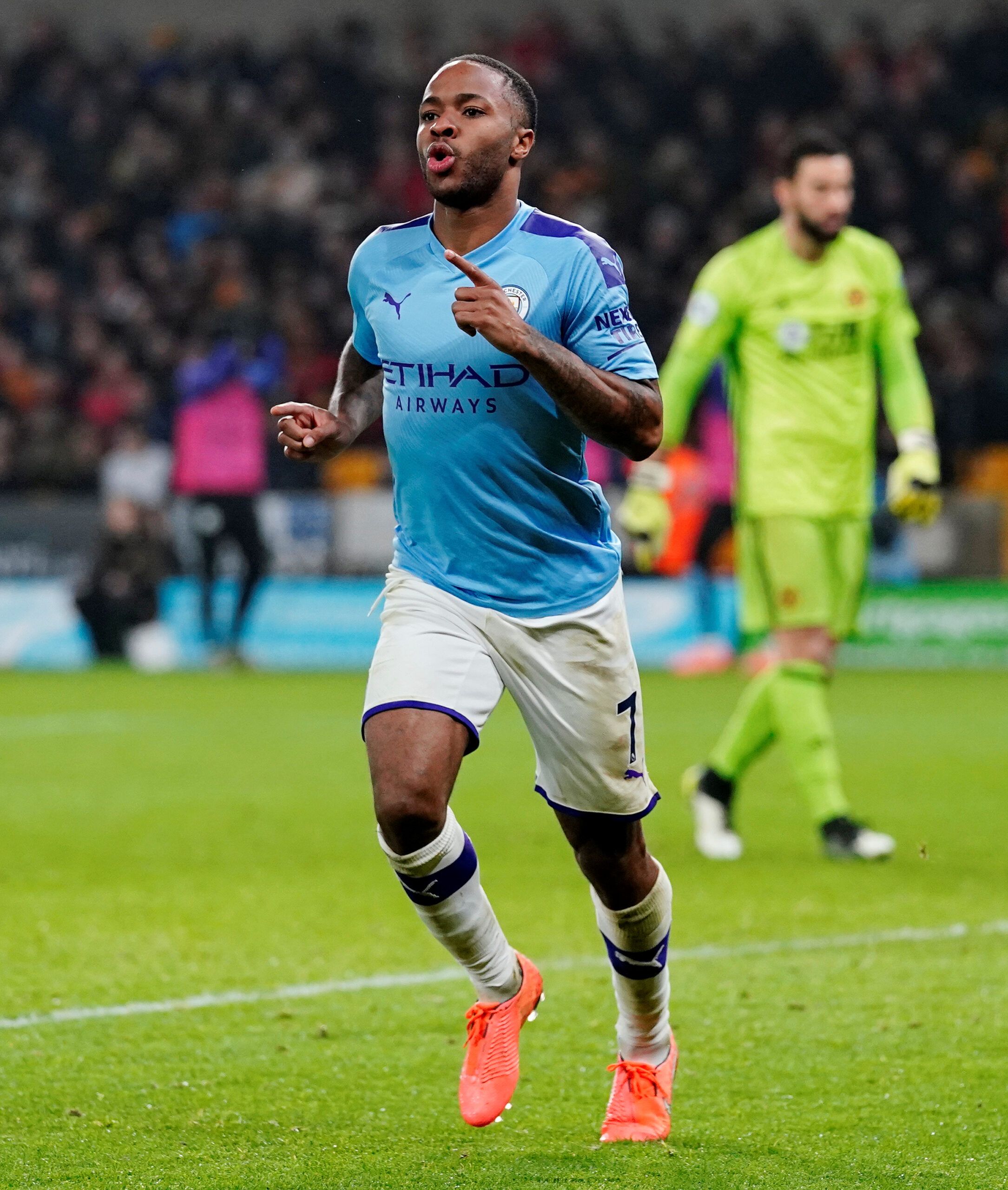 Sterling celebrates scoring for Man City in 2019.