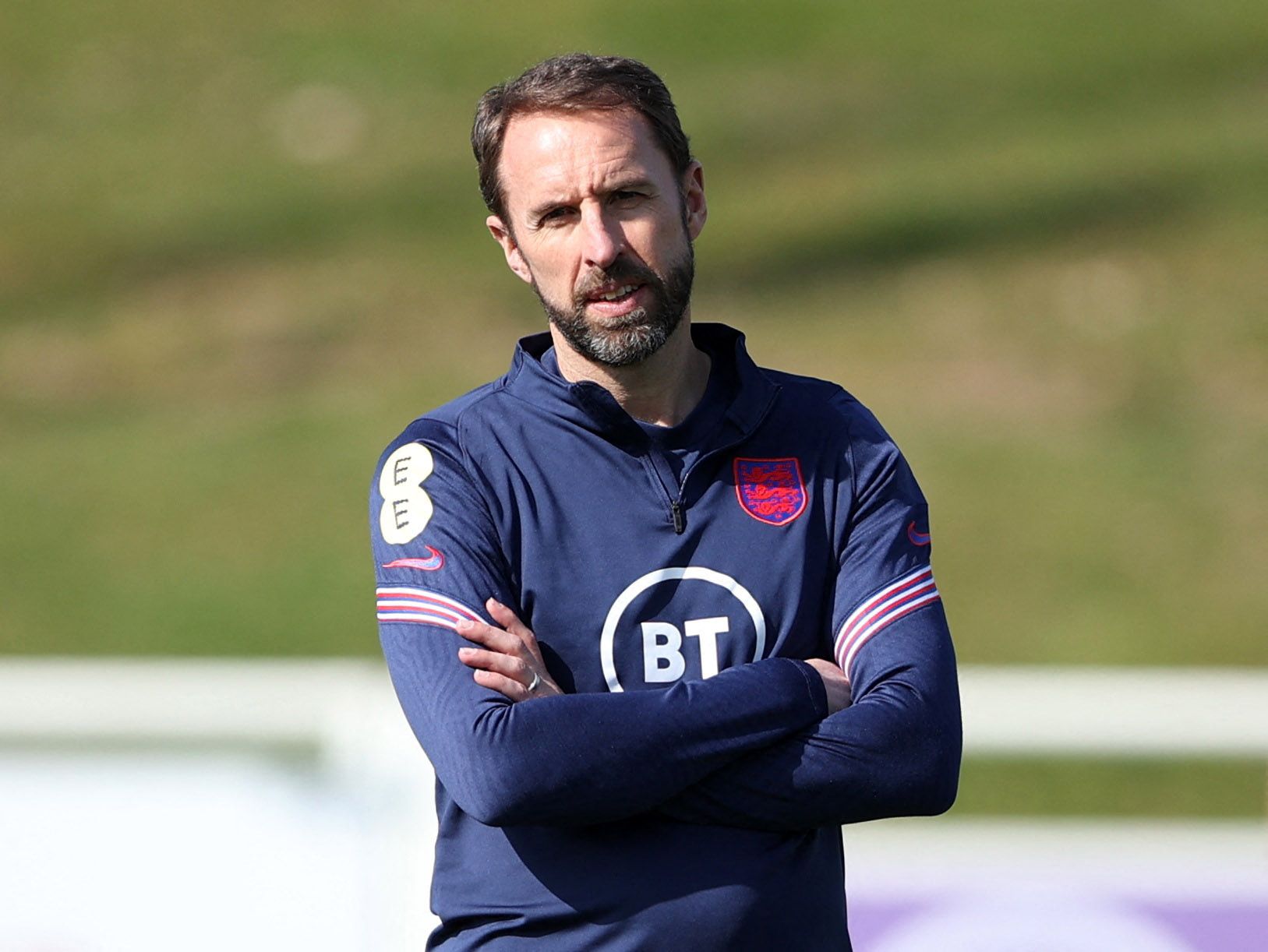 Southgate watches on during an England training session.