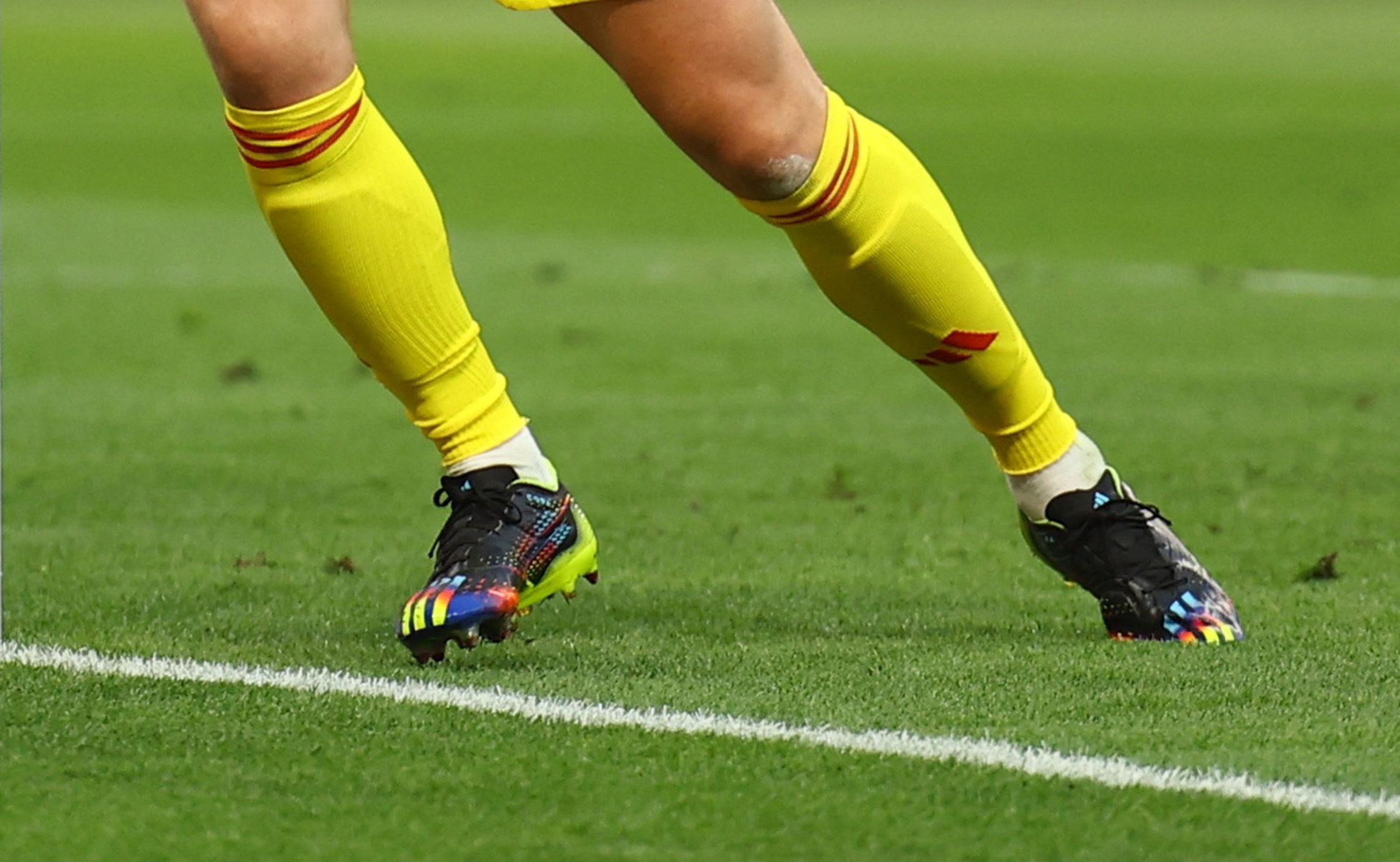 Rainbow inflections on Neuer's boots.