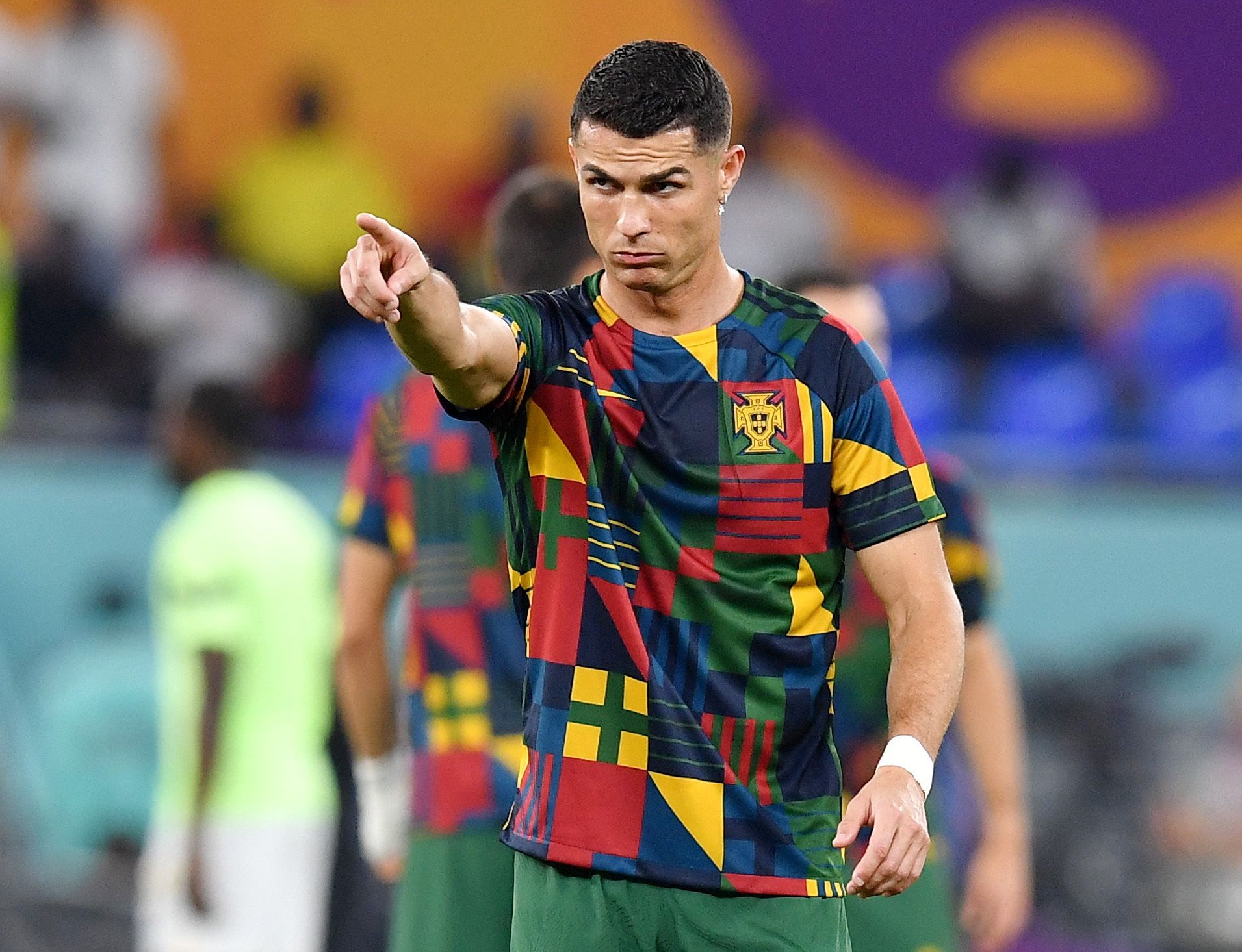 Ronaldo pointing during Portugal warm-up.