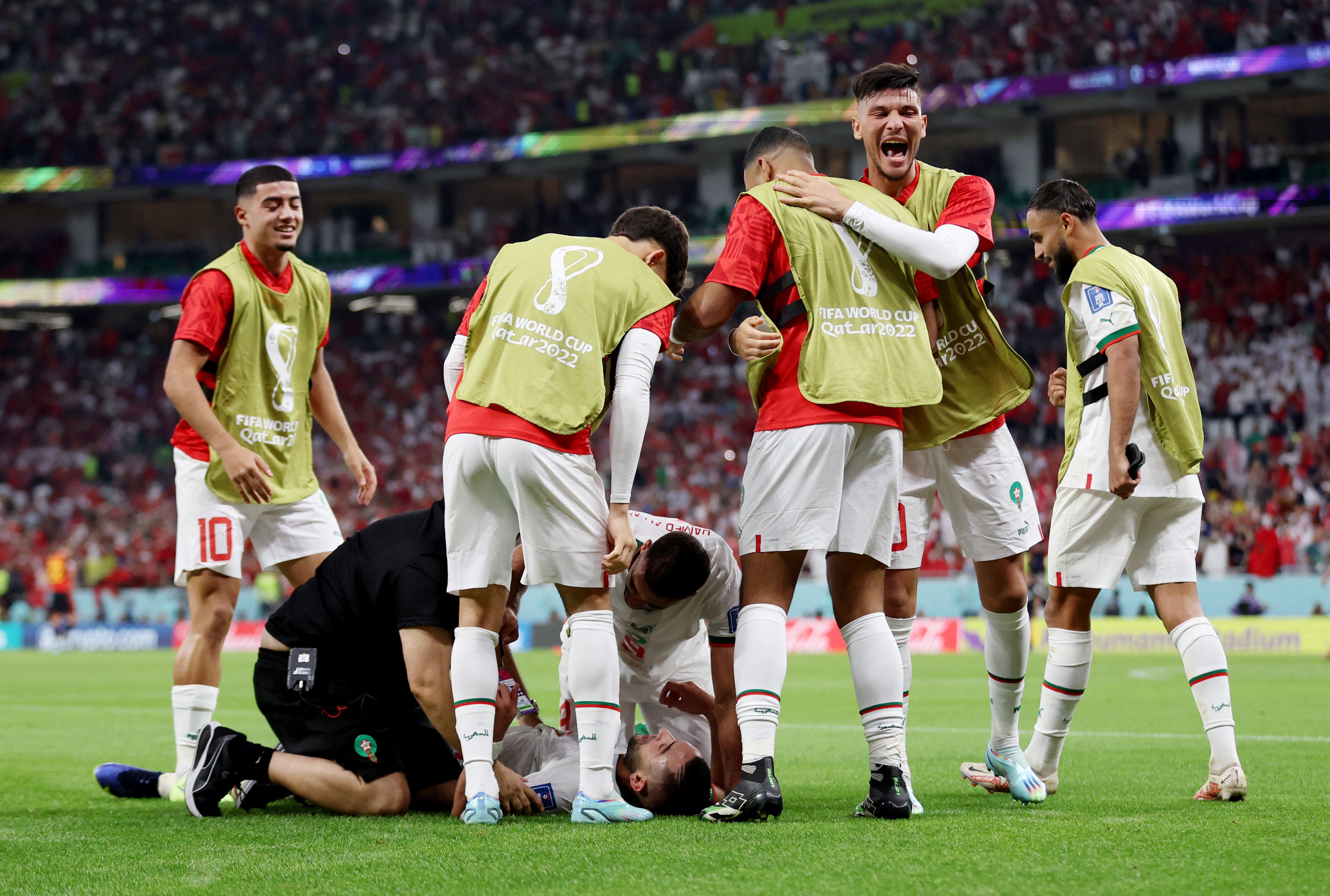 Morocco celebrate their win over Belgium.