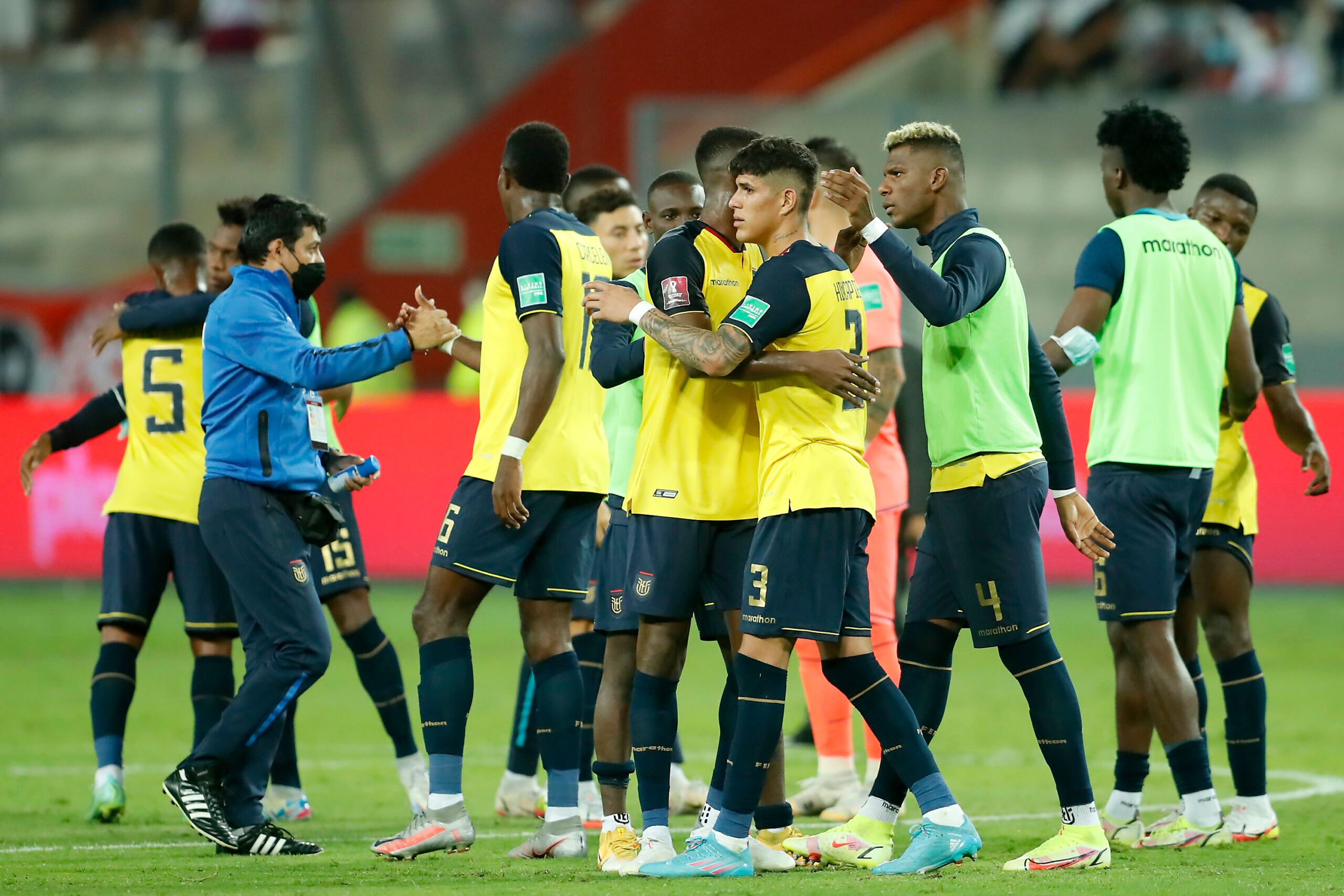 Piero Hincapie of Ecuador hugs with teammates after a a match between Peru and Ecuador as part of FIFA World Cup Qatar 2022 Qualifiers at National Stadium on February 01, 2022 in Lima, Peru