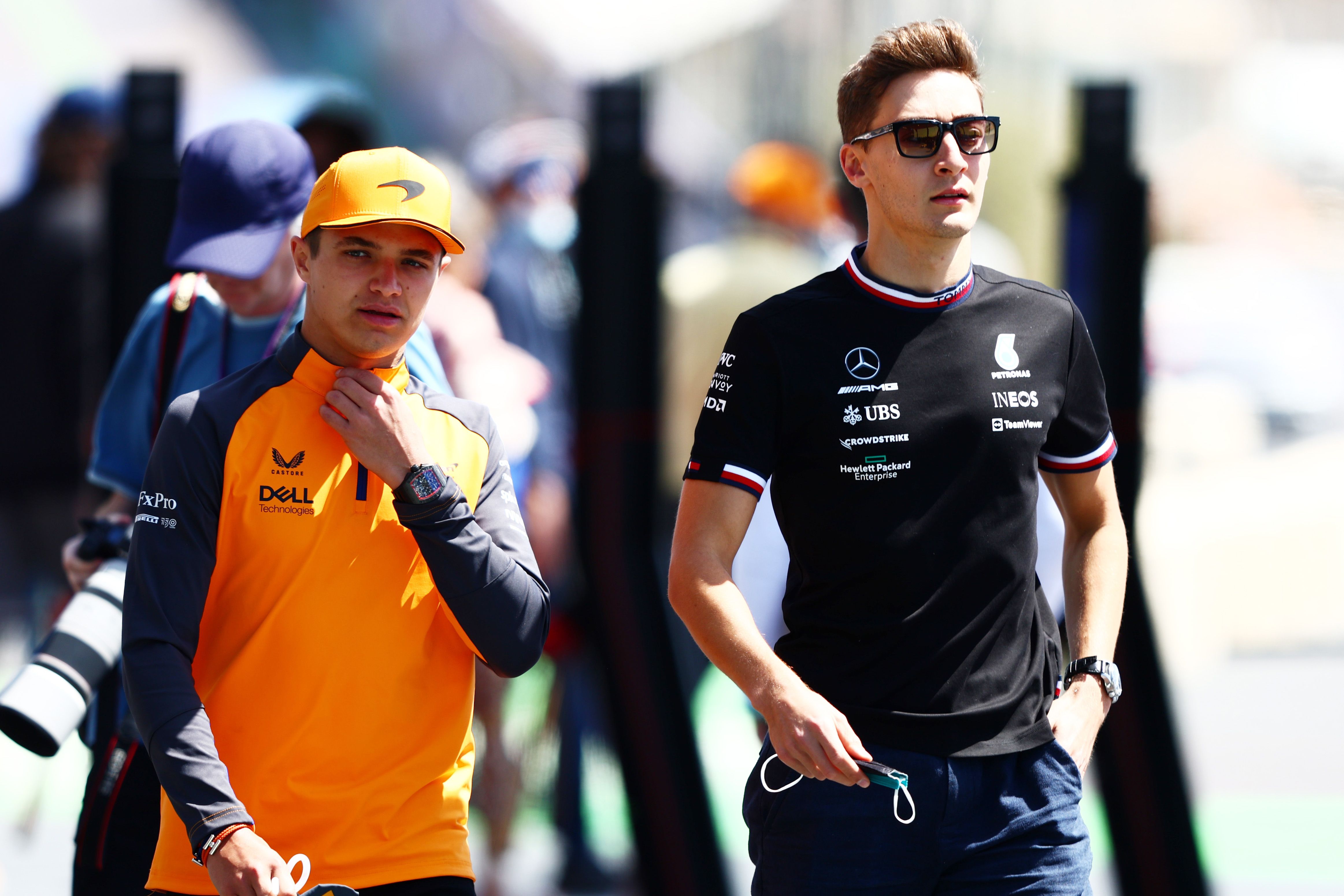 Norris and Russell in the F1 paddock.