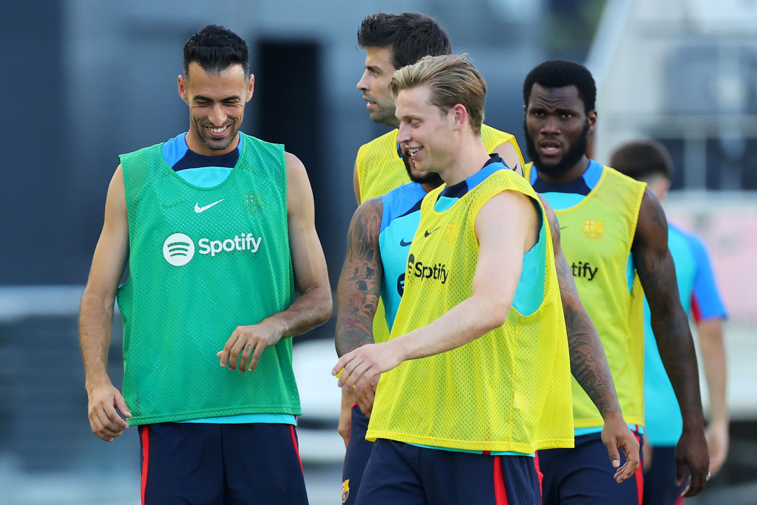 Barcelona players react during training session