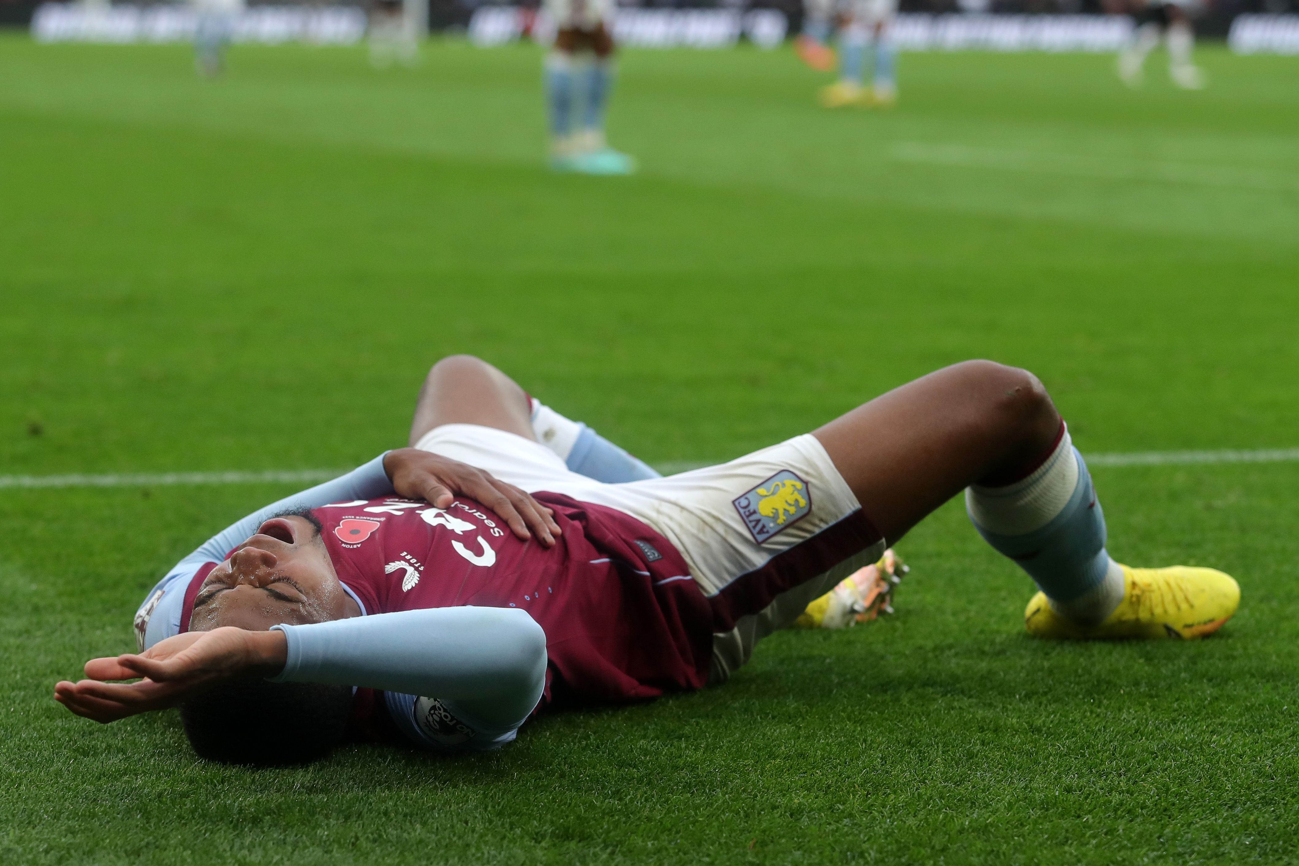 Aston Villa's Leon Bailey goes down with an injury