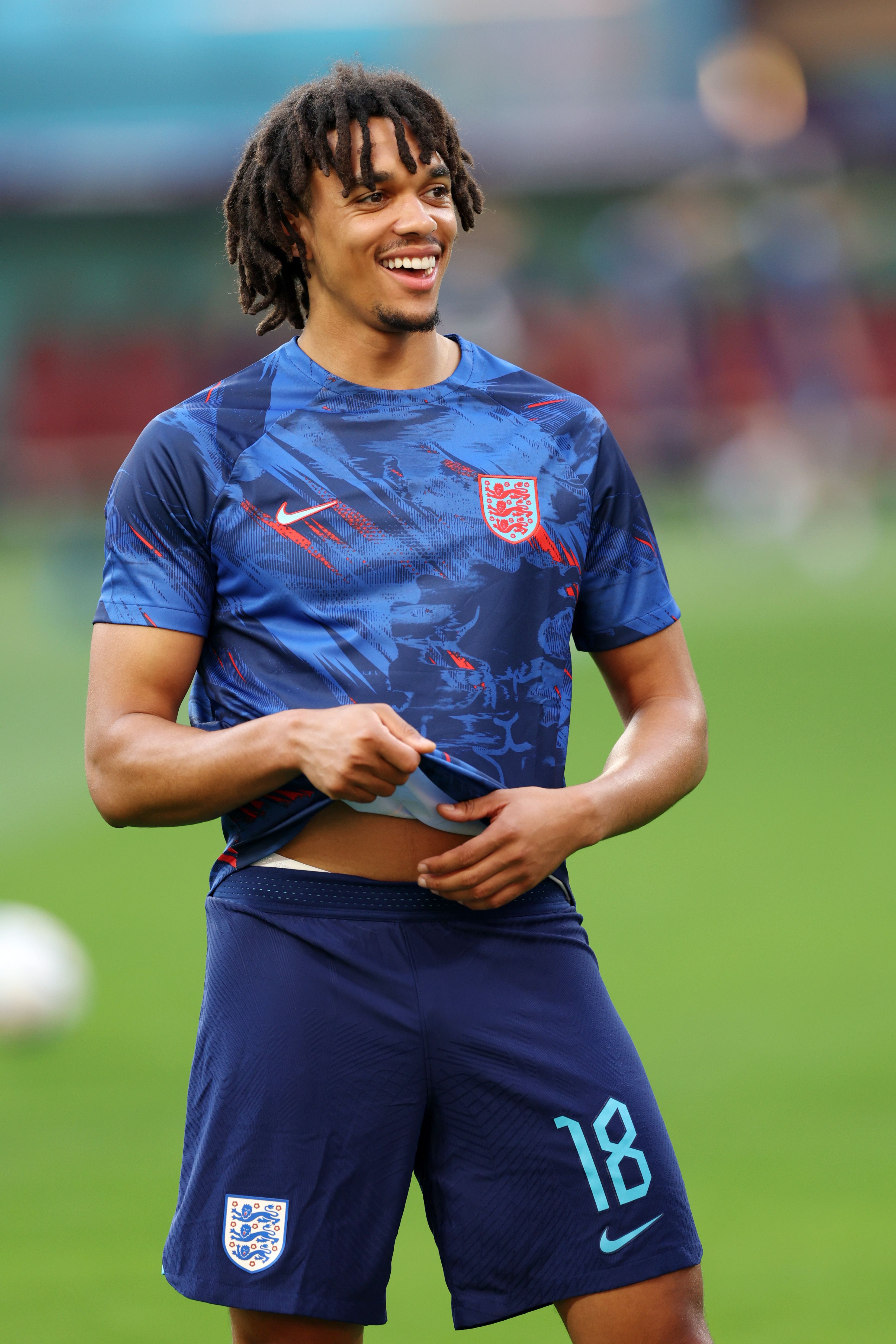Alexander-Arnold laughs in England training.