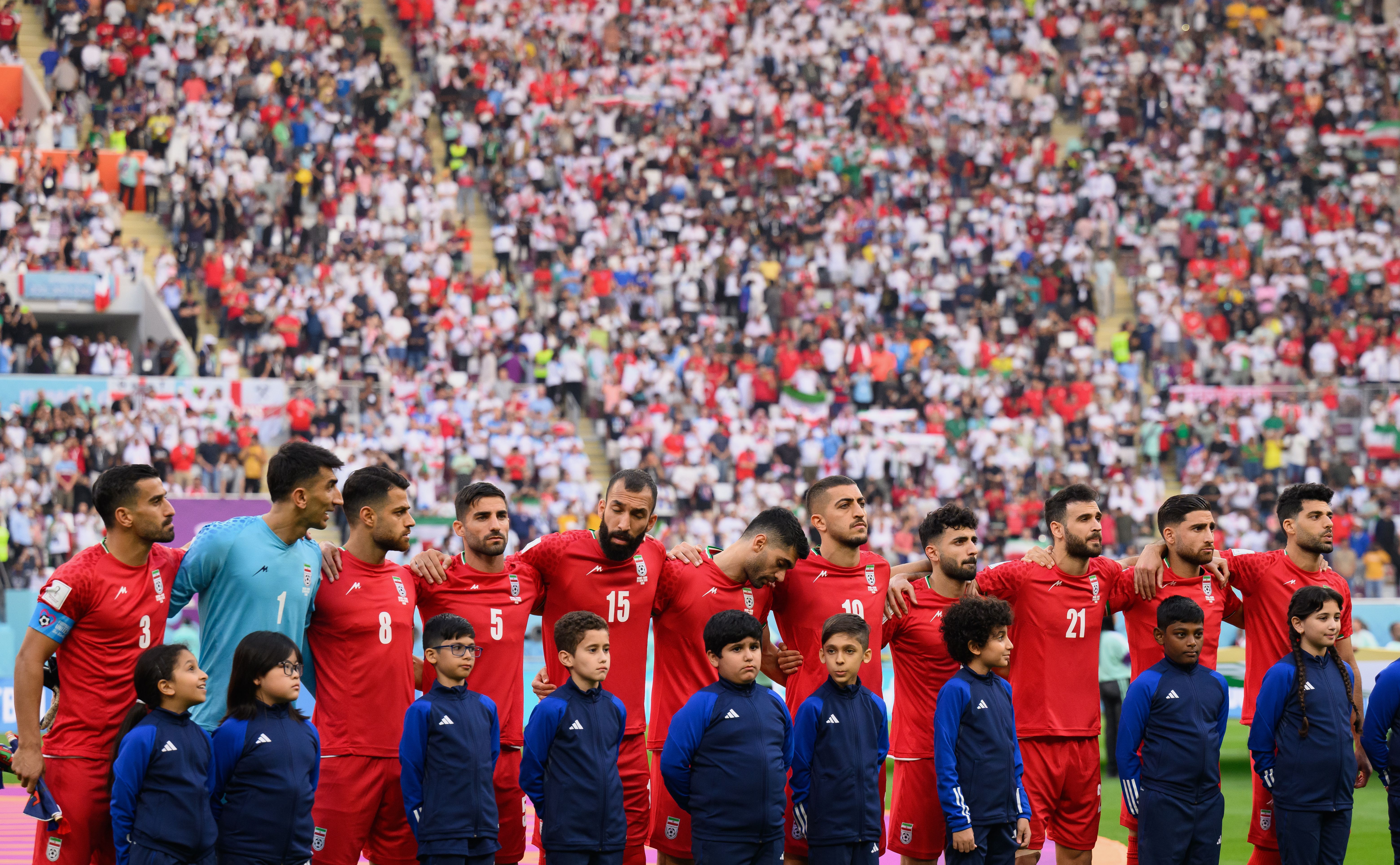  Iranian players line up for the national anthem prior to the FIFA World Cup Qatar 2022 Group B match between England and IR Iran at Khalifa International Stadium on November 21, 2022 in Doha, Qatar. 